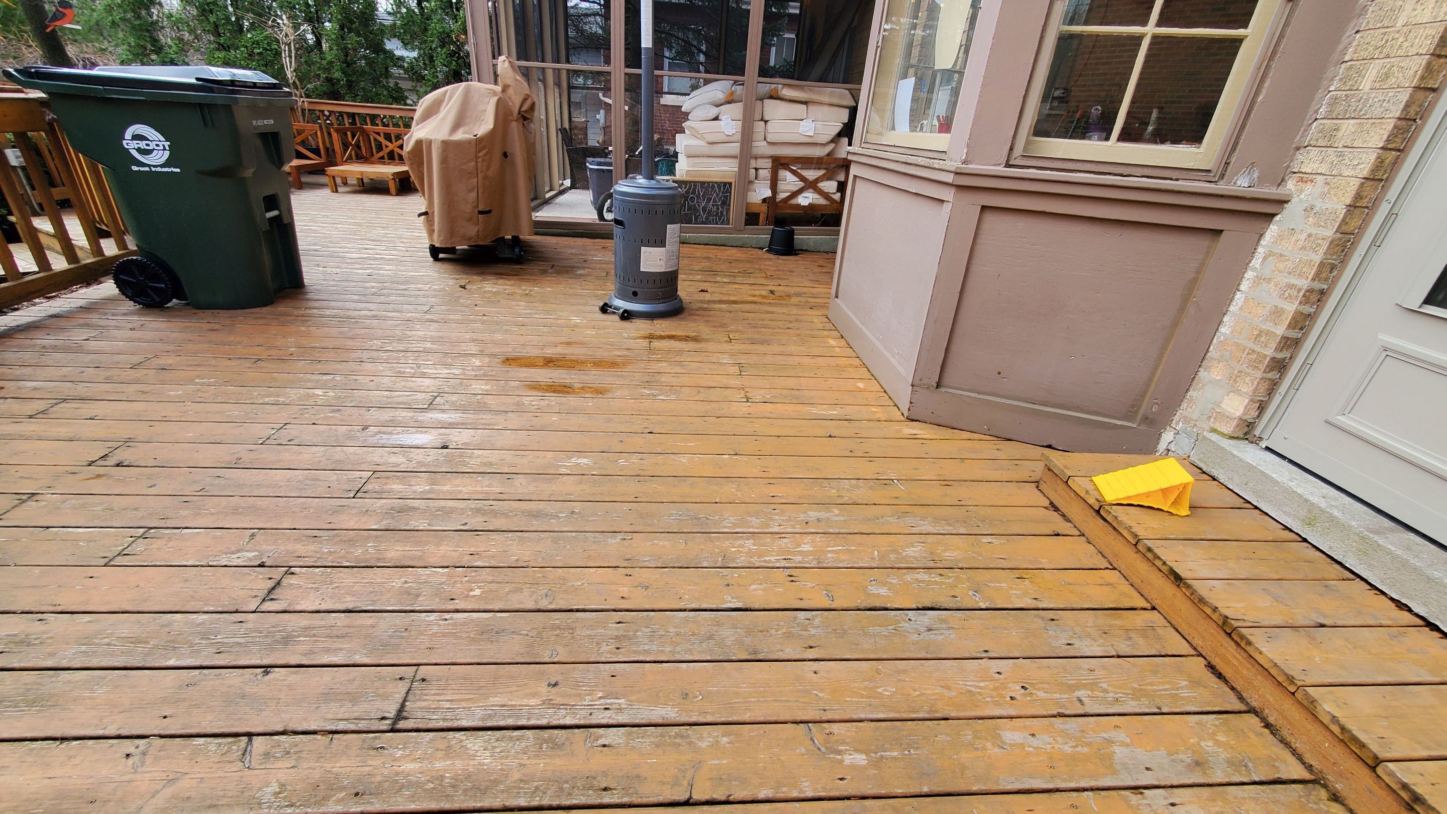 Wood cleaning and staining using Armstrong cloark oil stain by Northern Power Washing LLC.