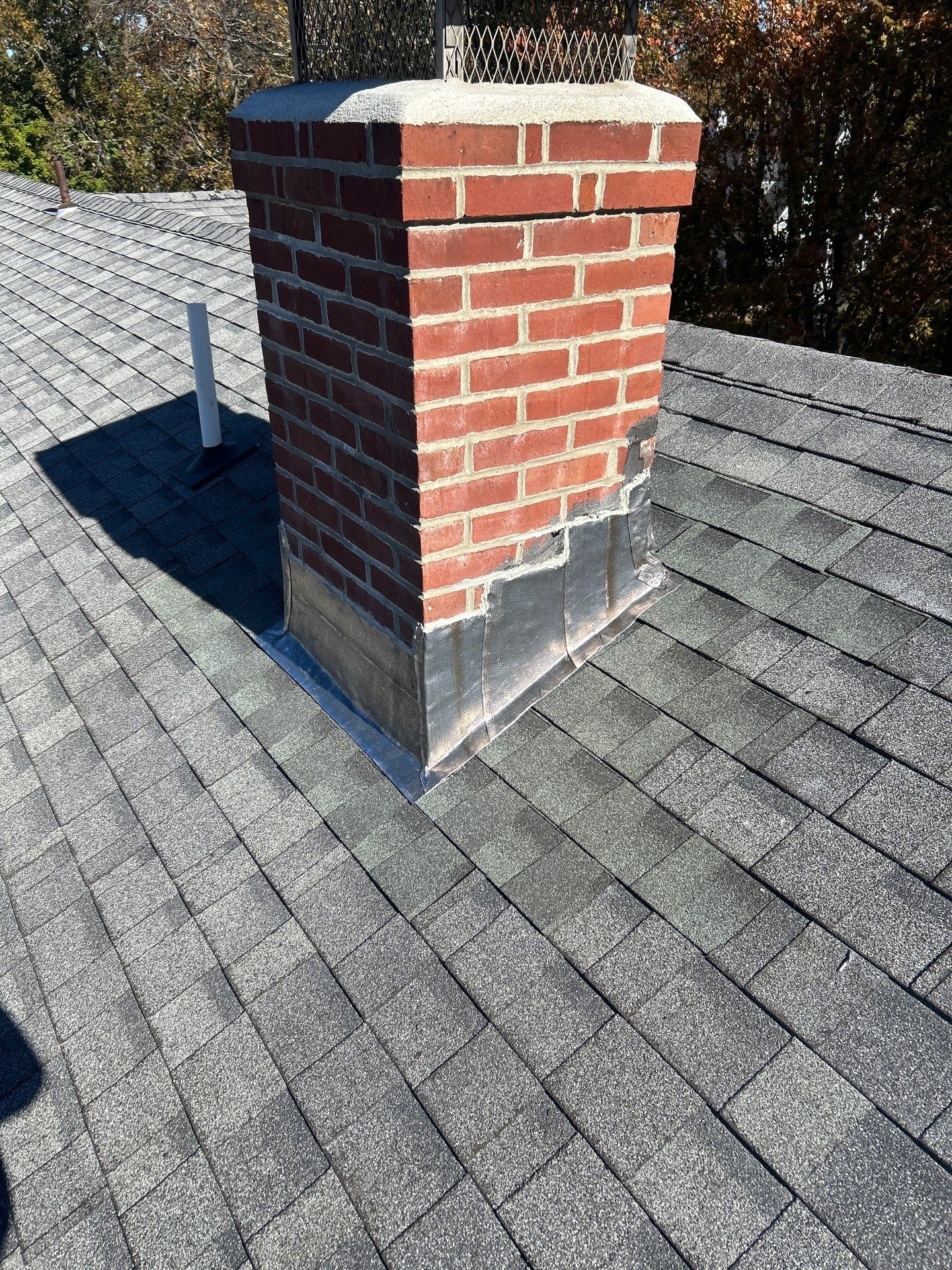 Chimney Flashing Repair & Leak Prevention | Andover, MA by Mighty Dog Roofing of Greater Middlesex County