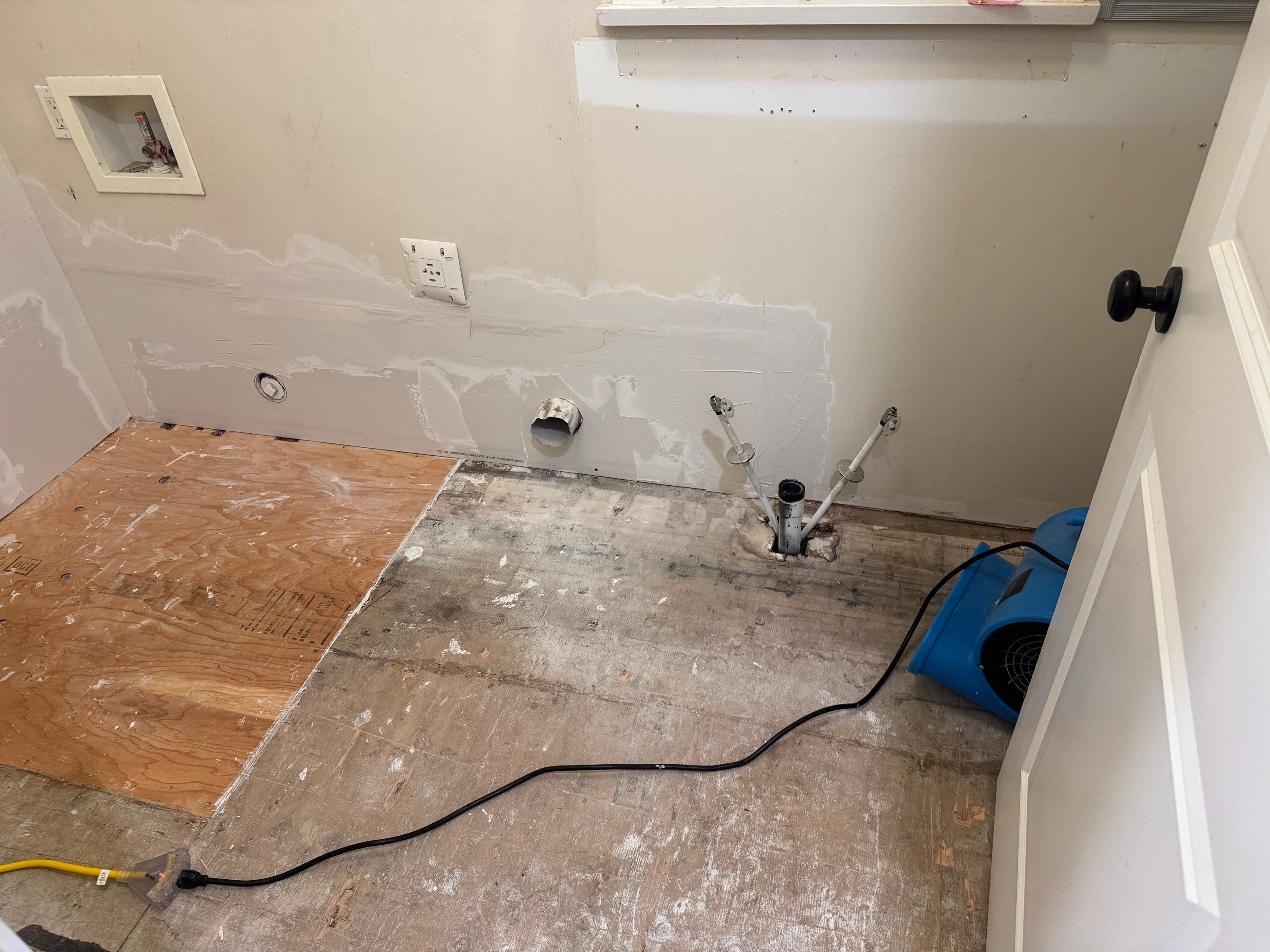 High-End Laundry Room Renovation and Restoration in Vancouver by YVR Construction Group