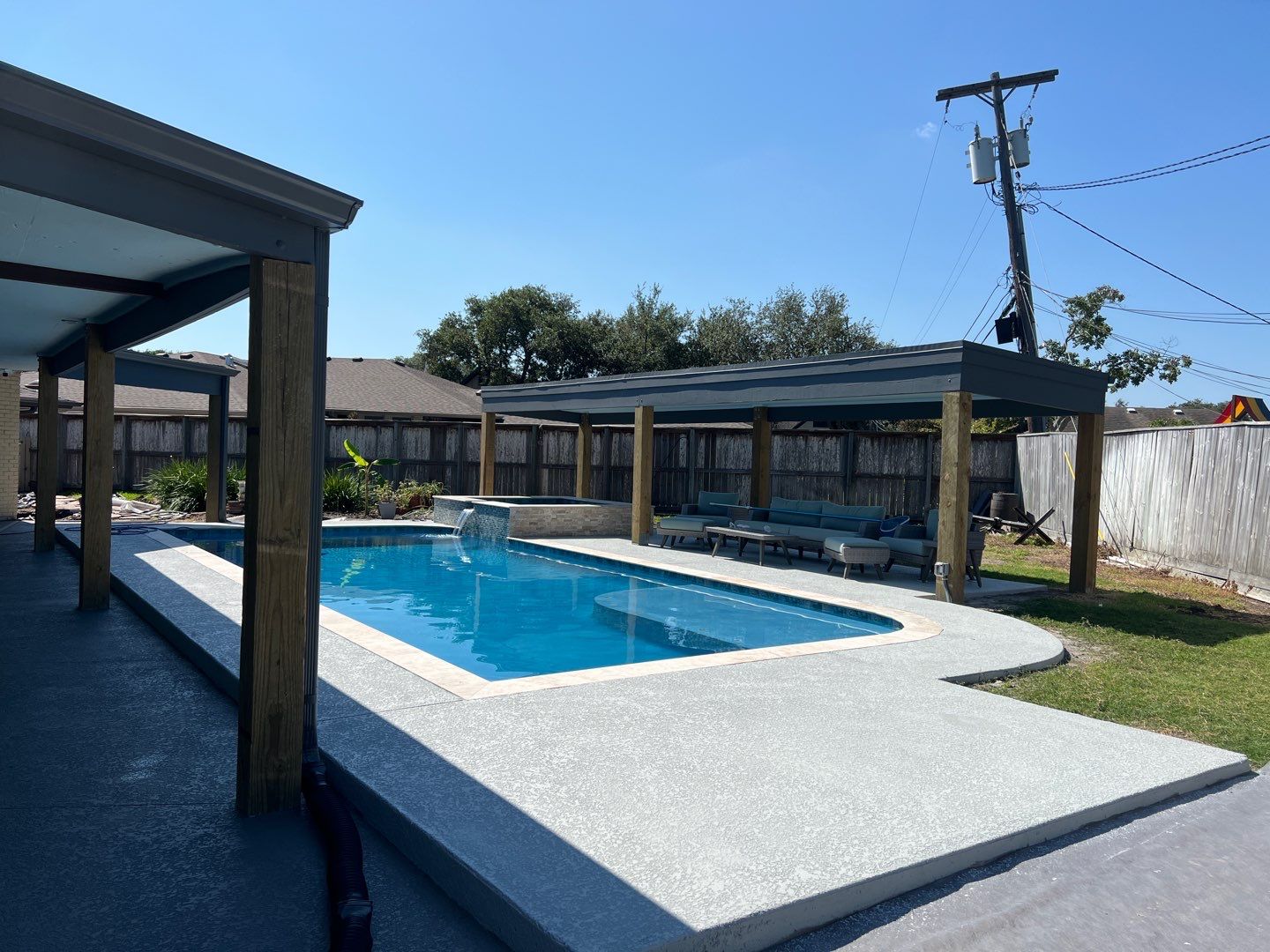 Beautiful pool side build by Bayfront Roofing and Construction