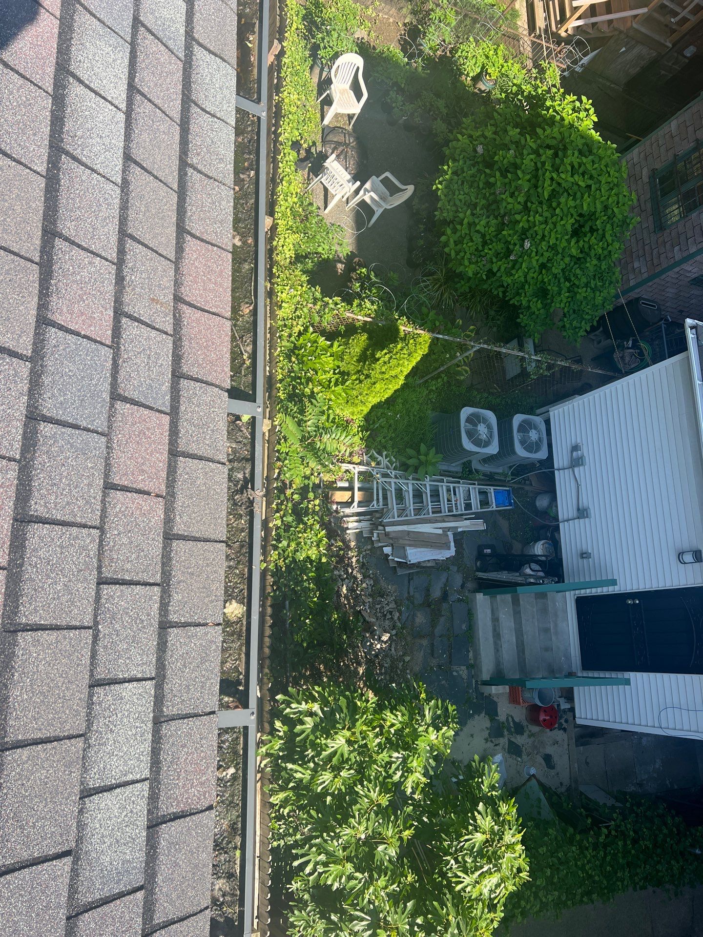 Commercial gutter cleaning Philadelphia, PA before photo with filled gutters