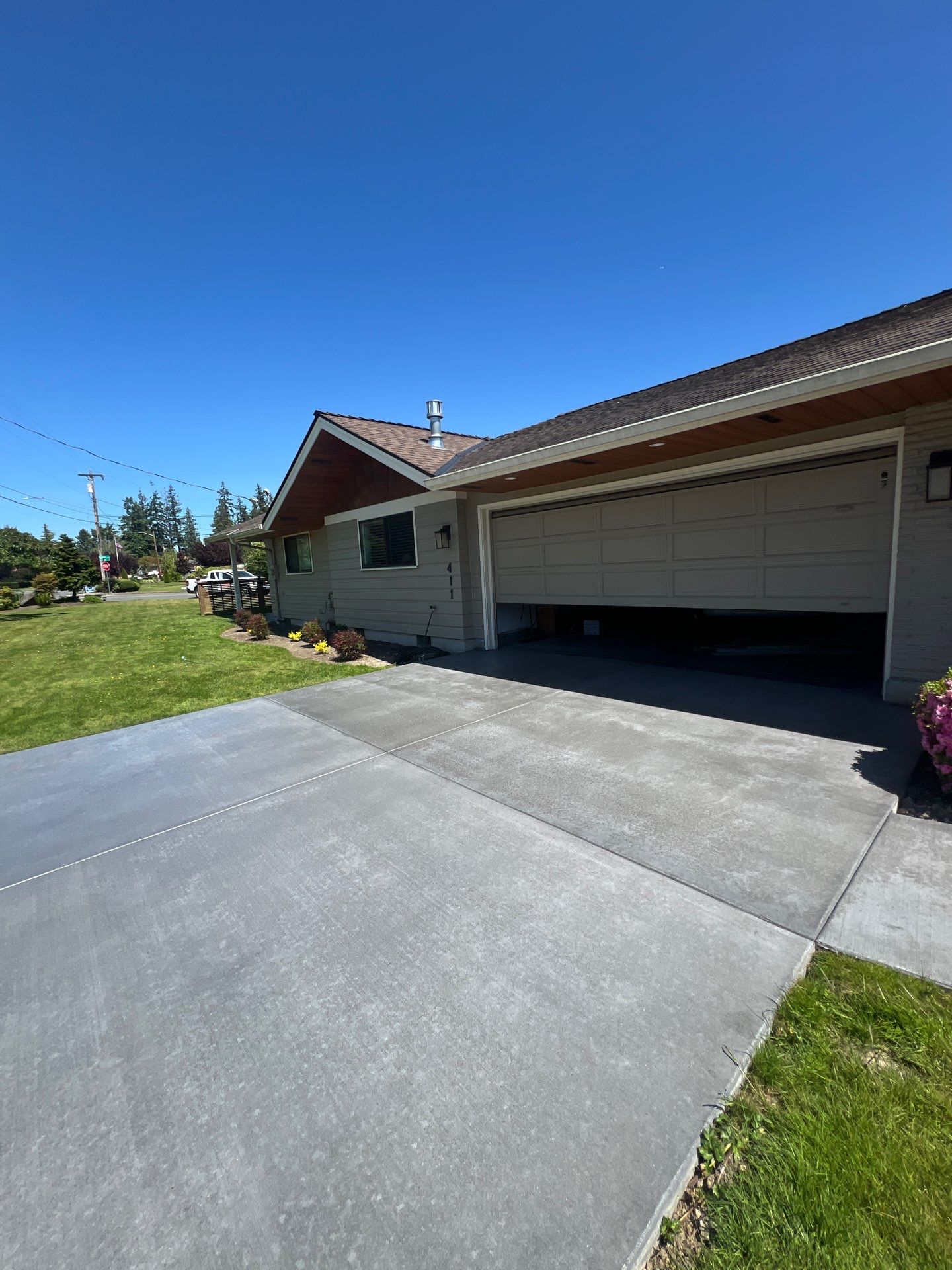 Colored Concrete Driveway Repair with Sealer| Everett    by Jireh Asphalt & Concrete Inc 