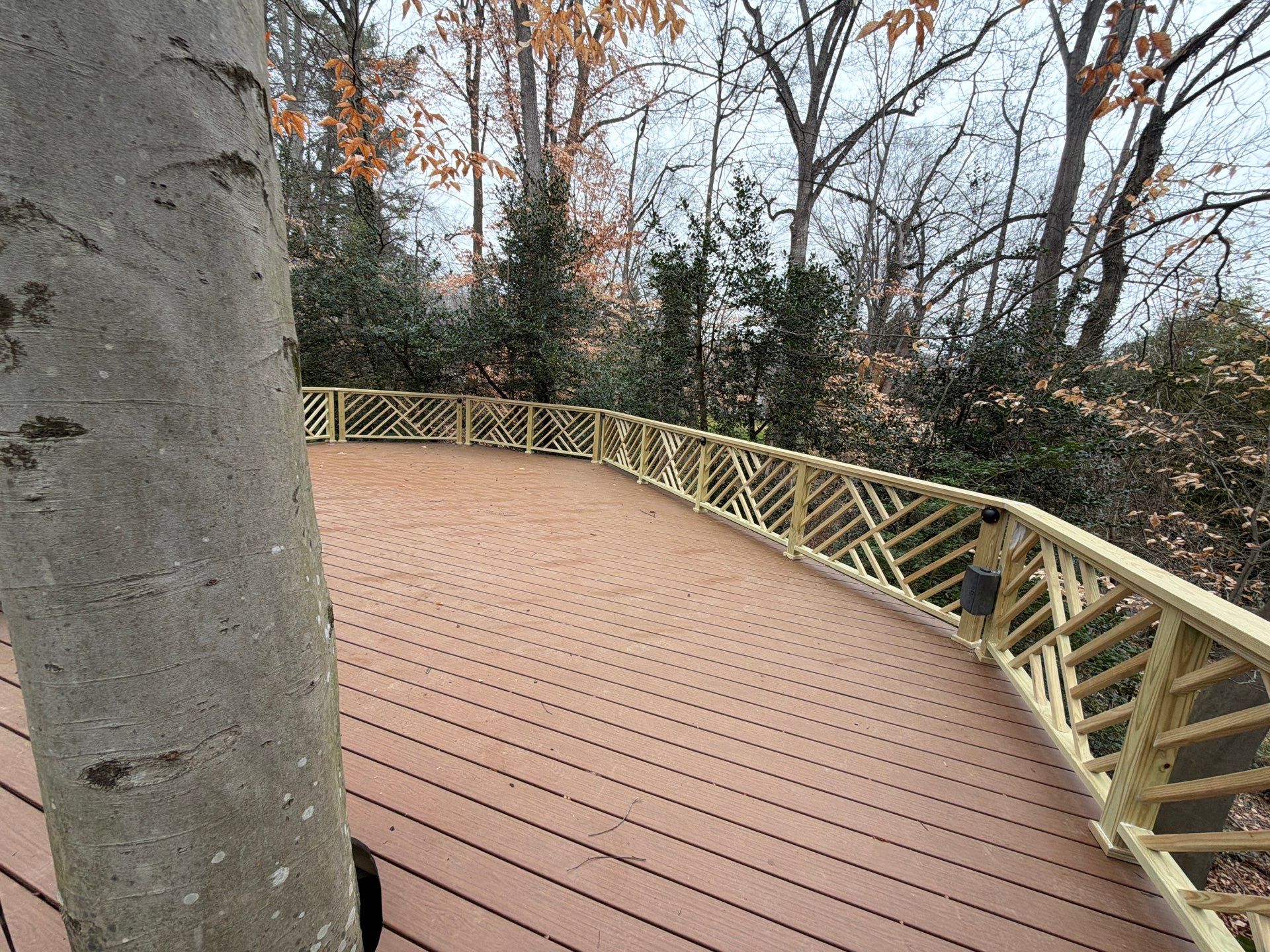 Custom Composite Deck Replacement with Geometric Railing in Bethesda, MD by Jakari Restoration & Construction LLC