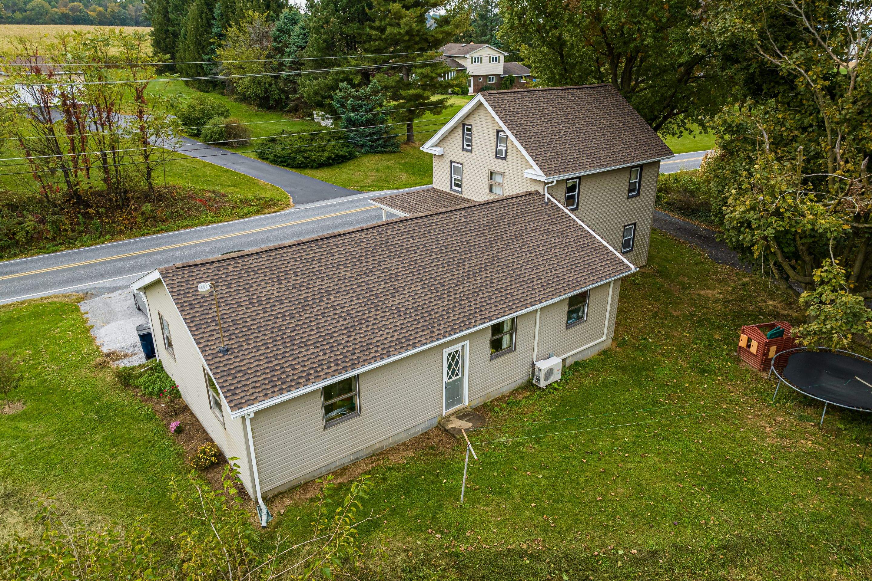 Reshingle-barkwood UHDZ- and new windows by Esh Builders