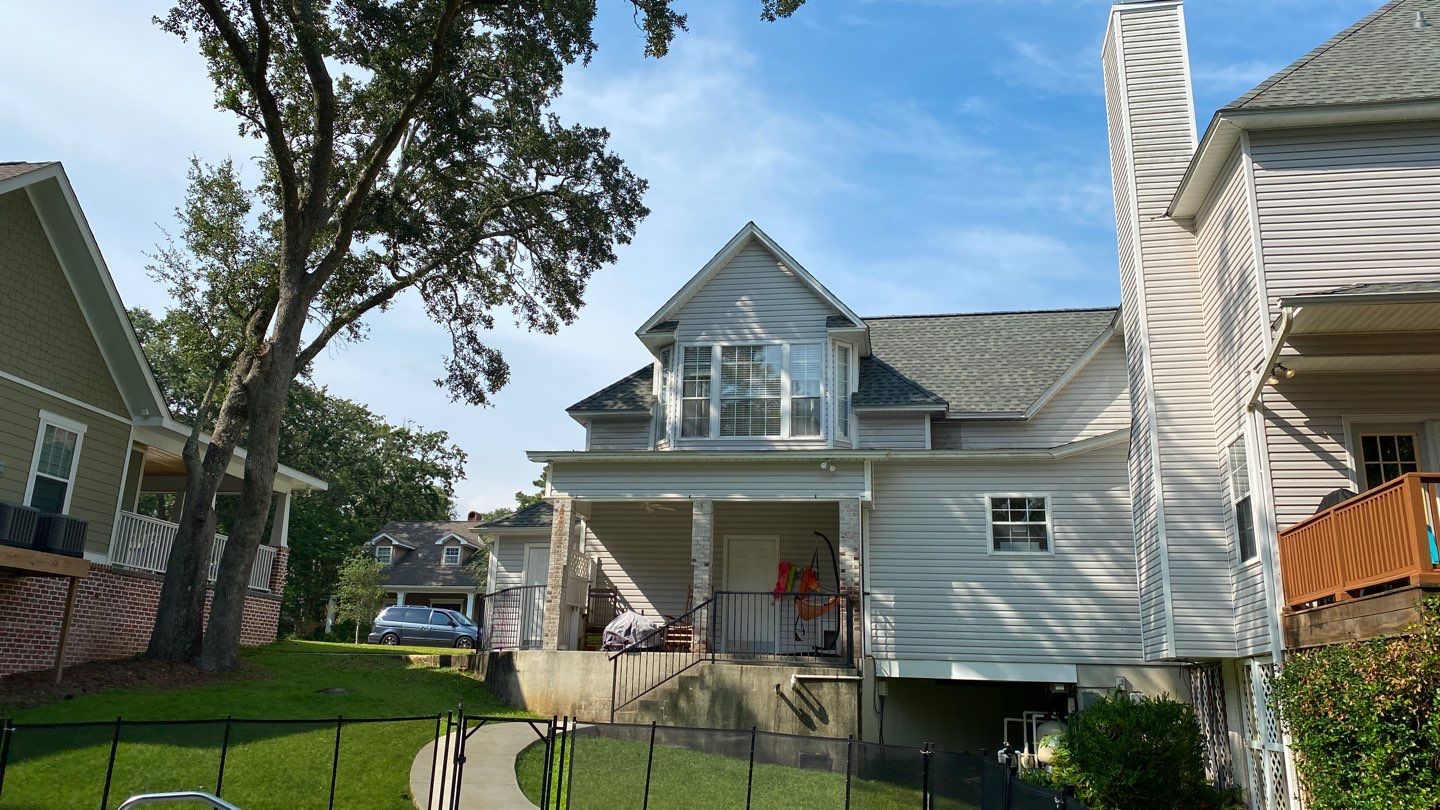 Residential Roofing Installation using Roof Replacement by American Roofing & Construction LLC