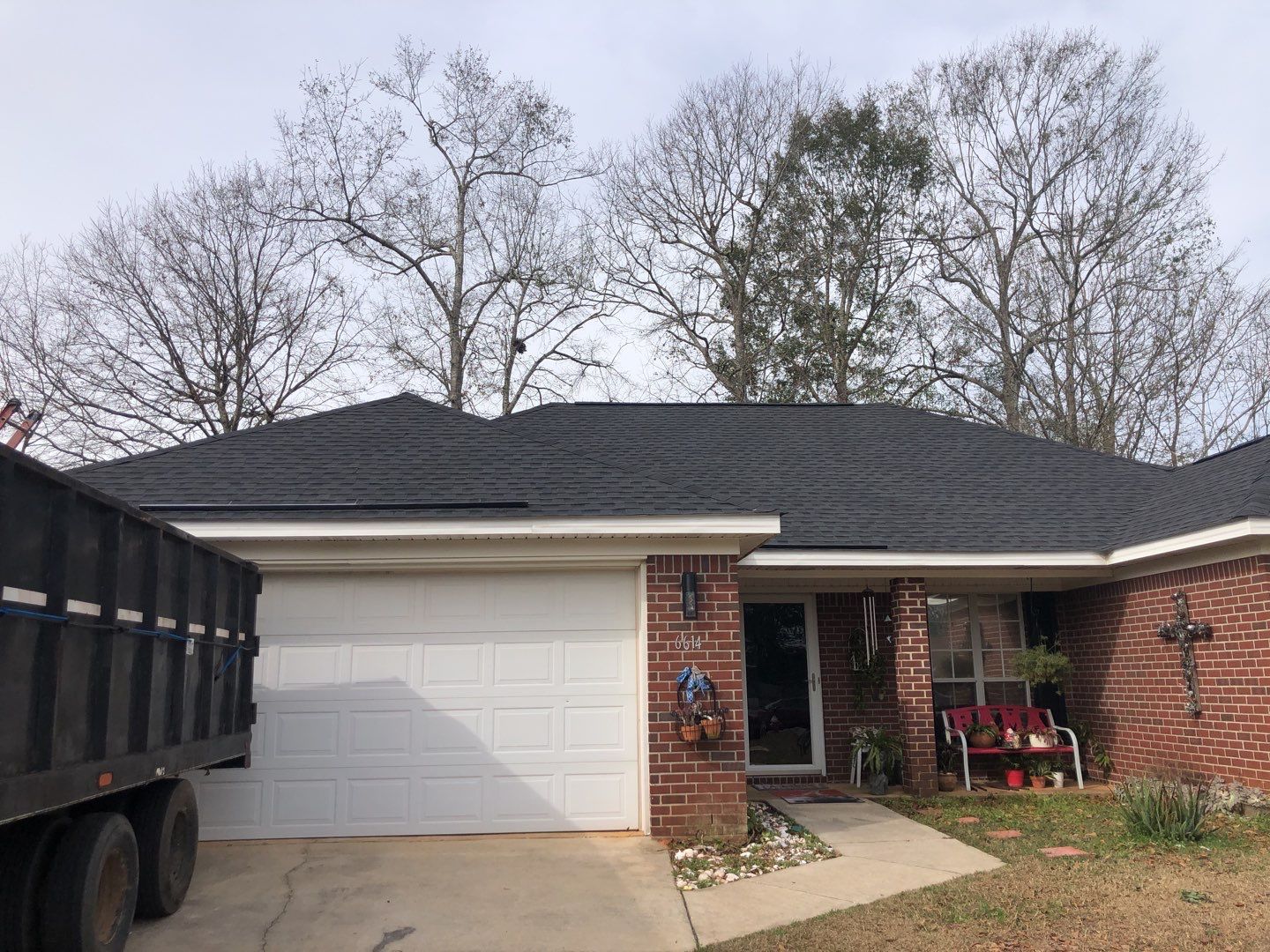 Residential Roofing Installation using Roof Replacement by American Roofing & Construction LLC