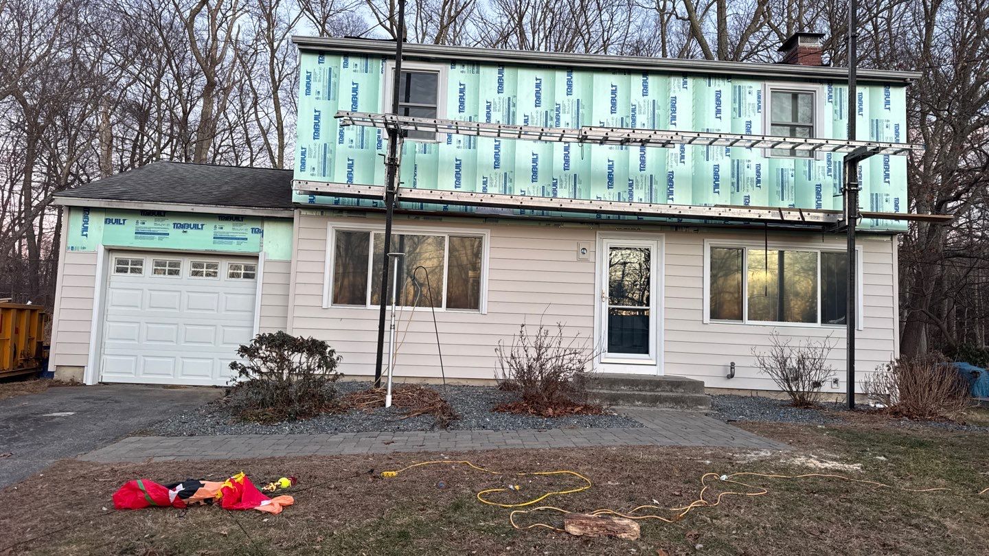 Siding Transformation with Certaplank S/7 insulated Herringbone, and Cert Monogram D/5x12' Dutchlap Wedgewood Blue by DiGiorgi Roofing and Siding Inc