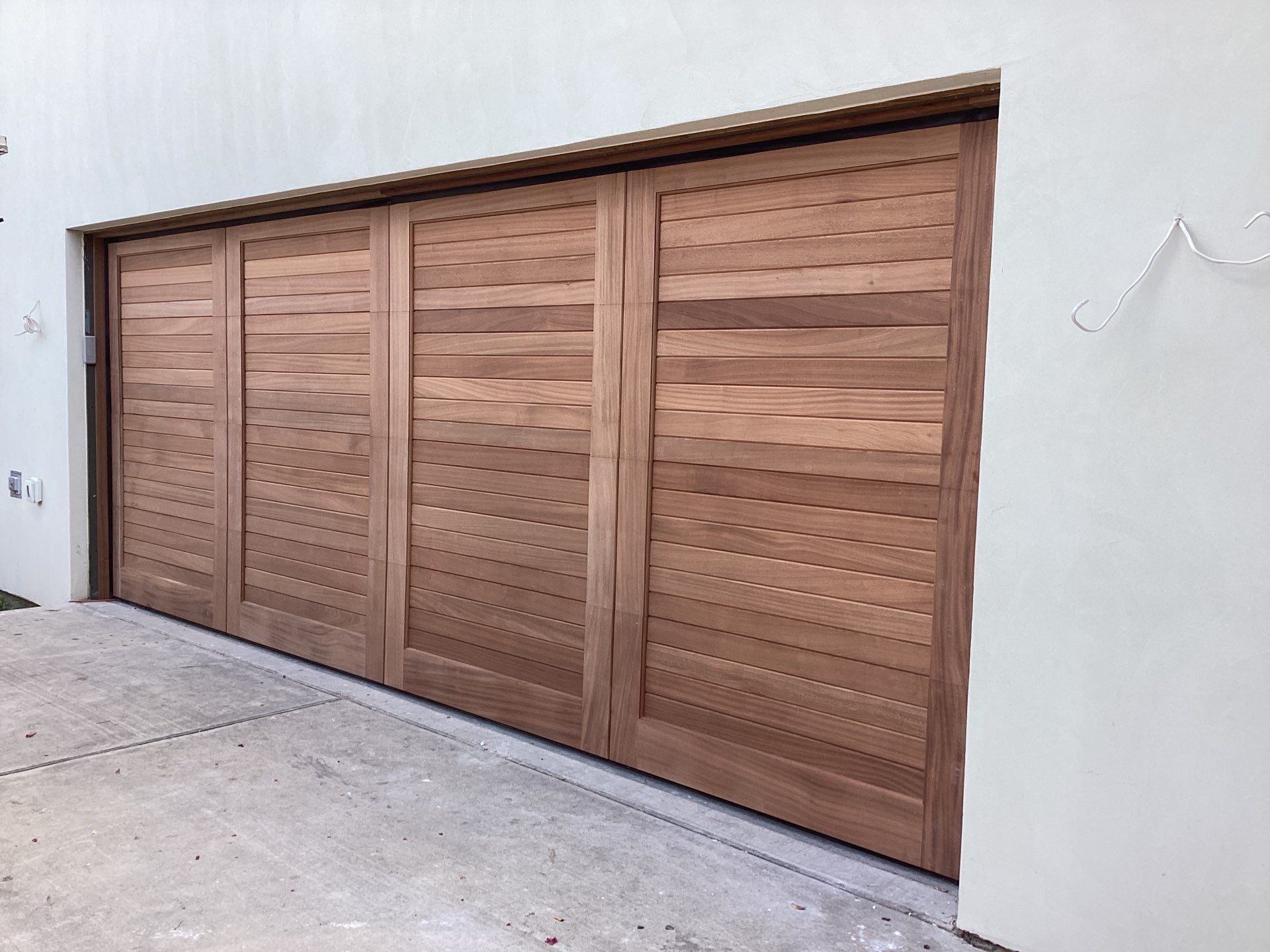 New Garage Door using Timberlane Wood Garage Door + LiftMaster Heavy Duty Opener by Meadows Garage Doors