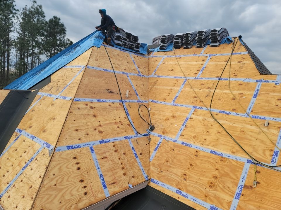 Residential Roofing Installation using Roof Replacement by American Roofing & Construction LLC