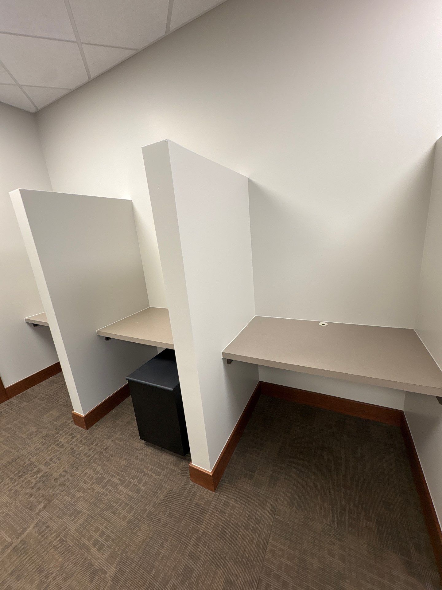 Commercial Office Interior Remodel and Modern Suite Refresh in Sioux Falls by Select Painting, Coatings & Garage Cabinets