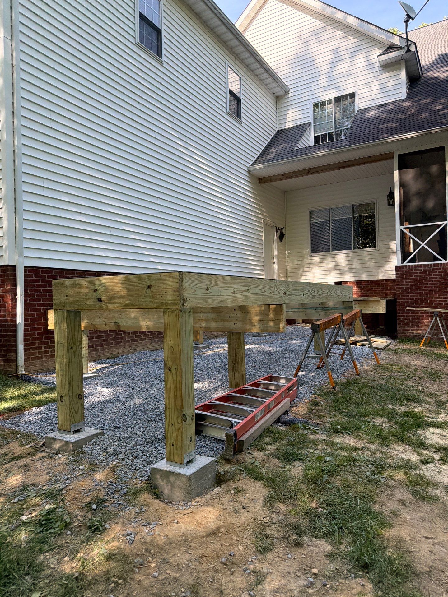 Custom Composite Deck and White Vinyl Railing Installation in Fayetteville by Walnut Hollow Decks & Outdoor Living