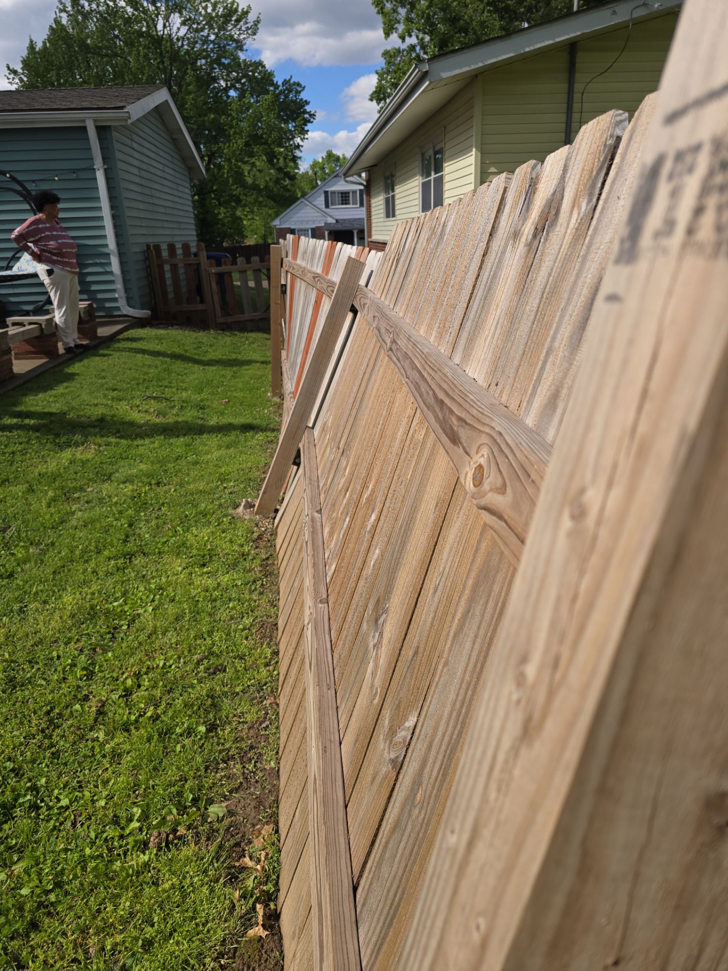 Wood Fence Post Replacement & Stabilization – Florissant, MO by Legendary Services Company LLC.