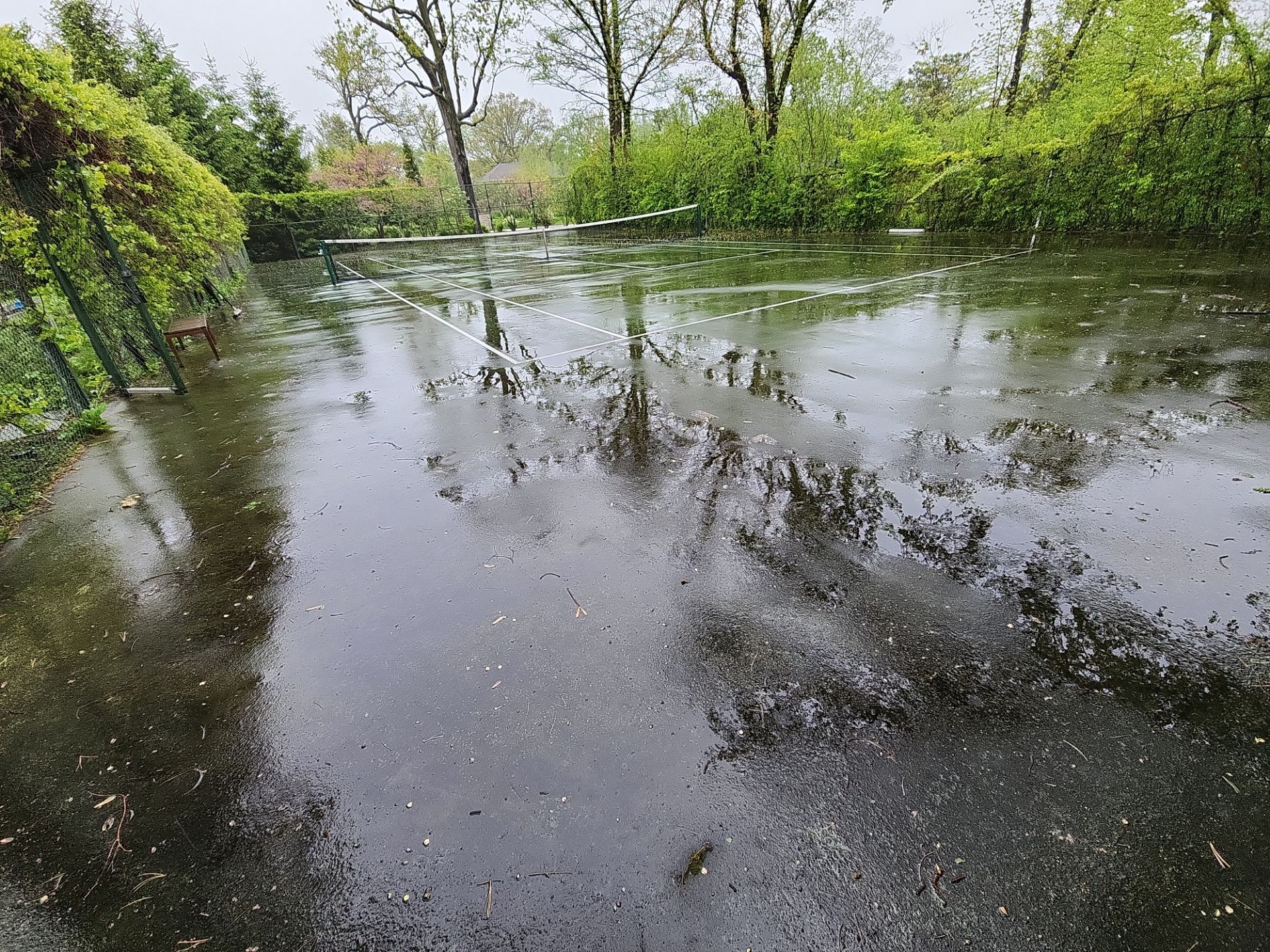 Tennis Court using Algaecide, soft wash soap by Northern Power Washing LLC.