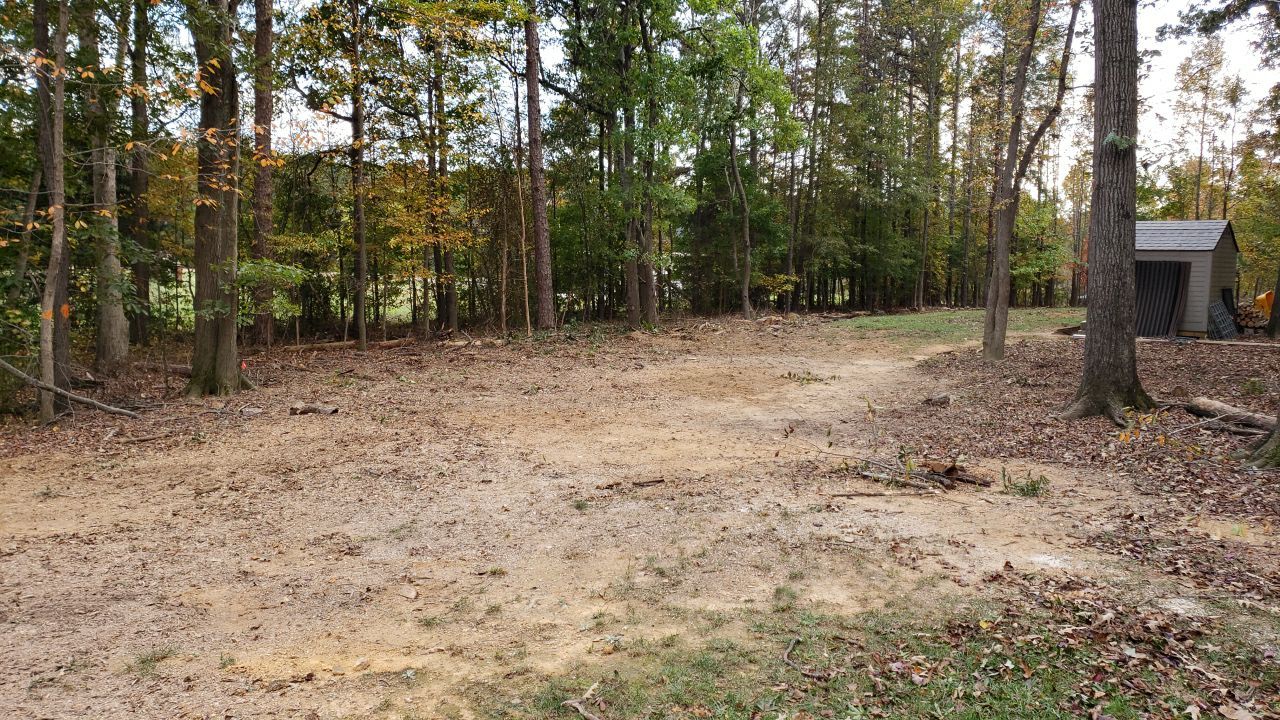 land clearing using machinery by Power Wash Masters LLC