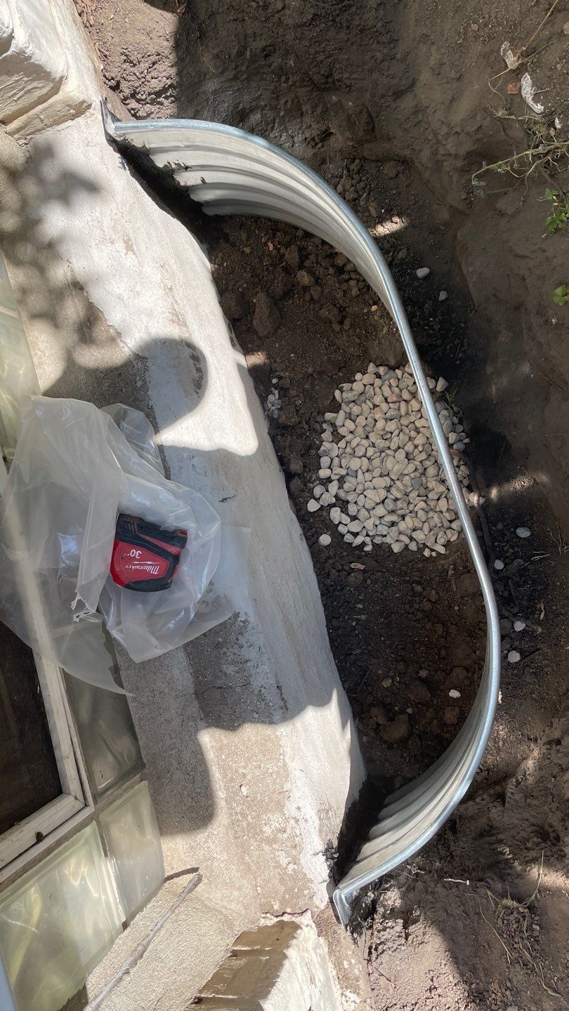 Drain Tile, Window Wells & Buried Discharge in Minneapolis by Waterproofing Northeast