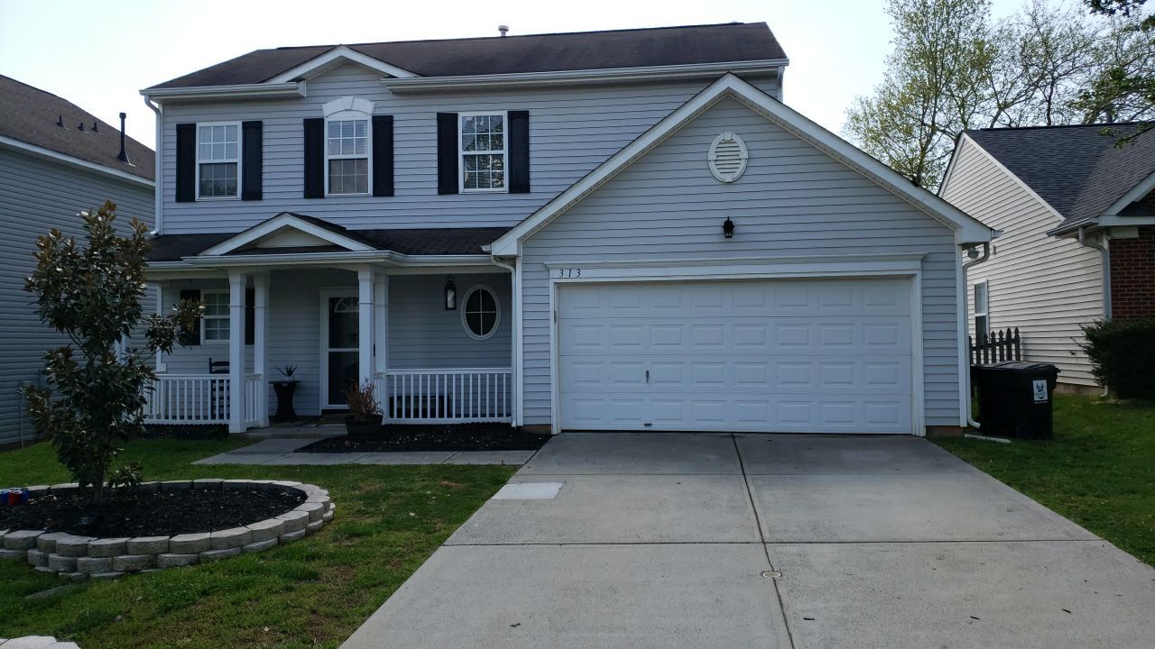 House Wash using cleaner by Power Wash Masters LLC