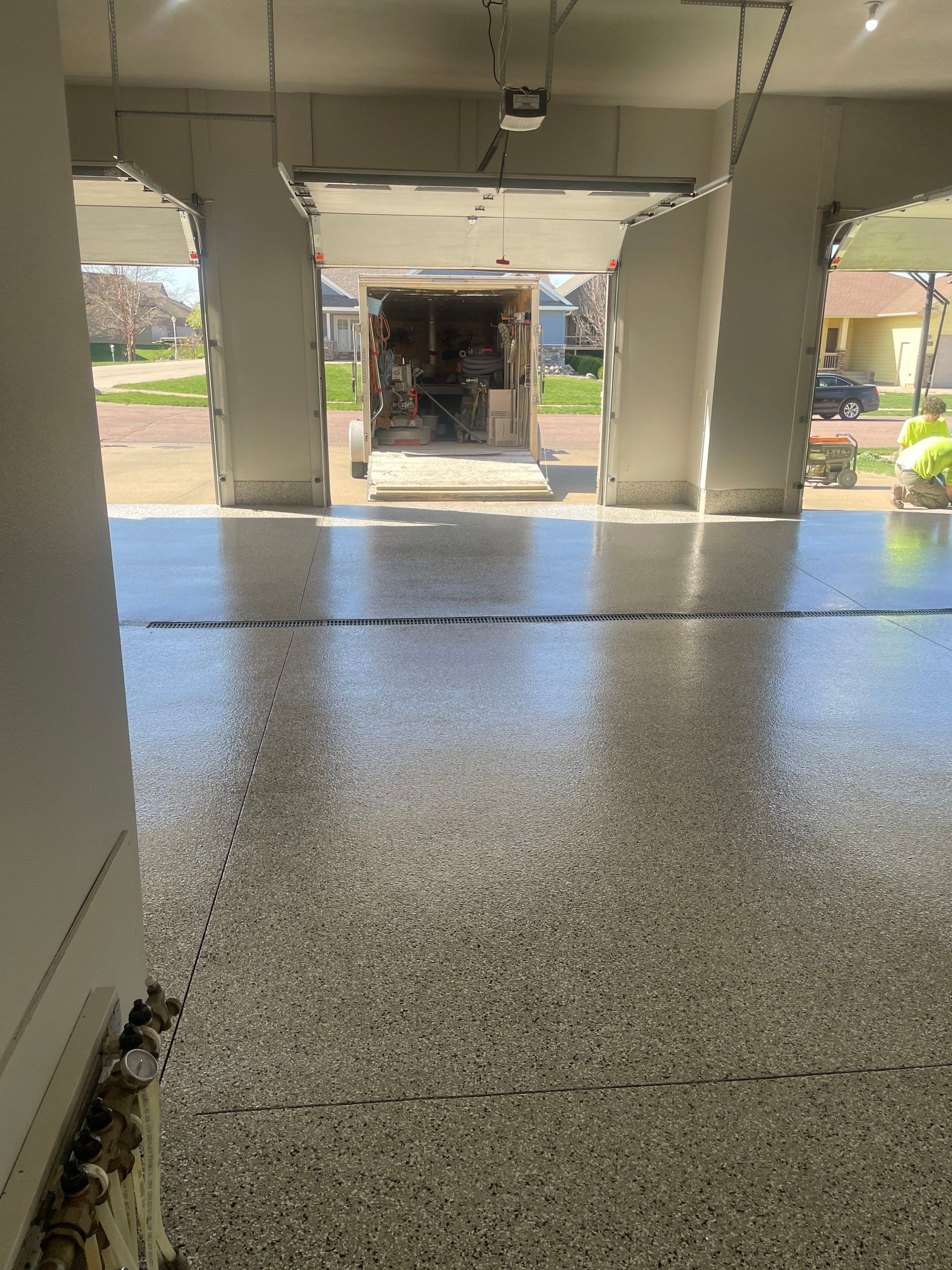 Multi-Car Garage Epoxy Floor Coating in Beresford by Select Painting, Coatings & Garage Cabinets