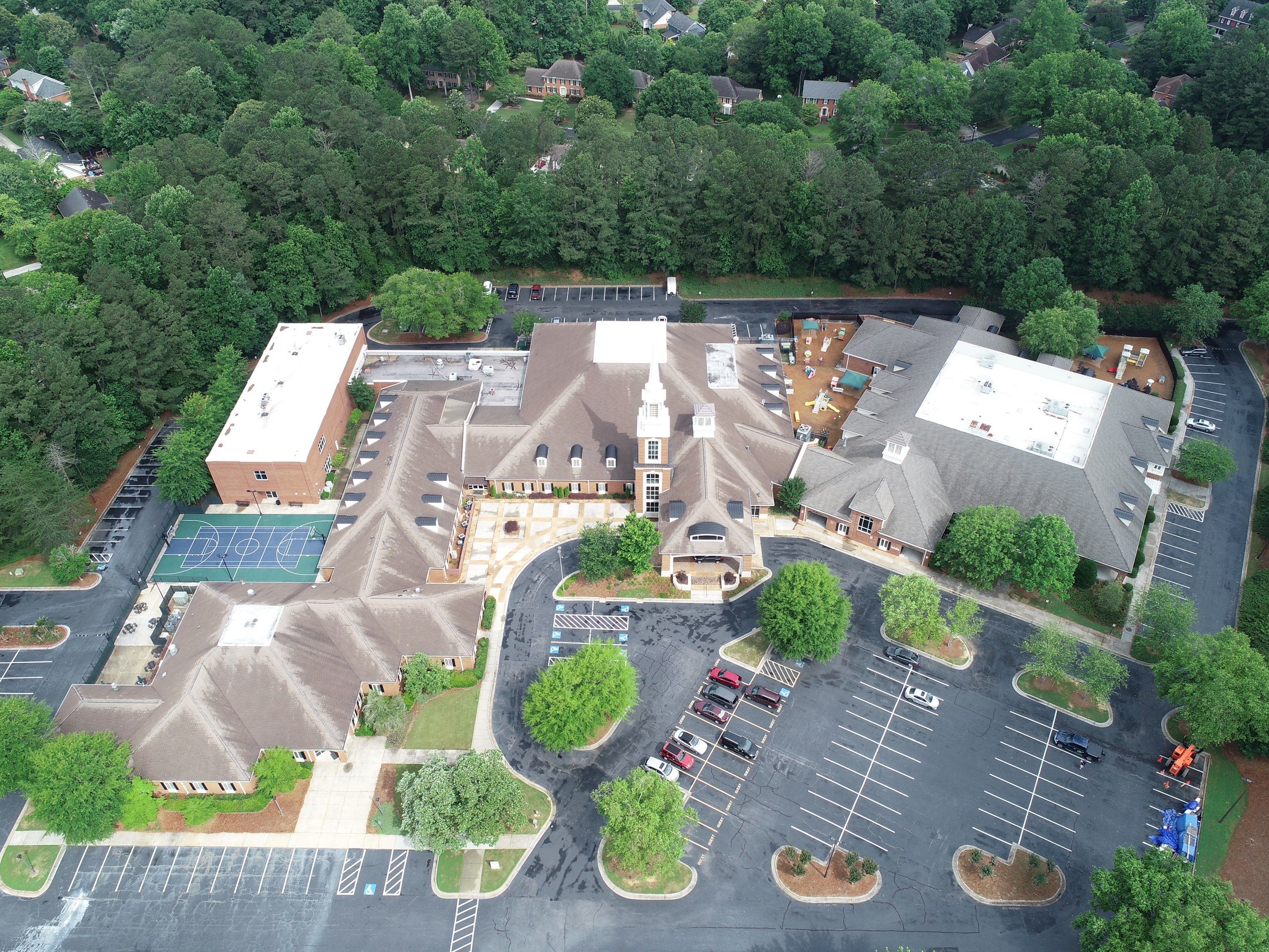 Baptist Church in Peachtree Corners Shingle Roof Replacement and Coating by Georgia Roof Advisors