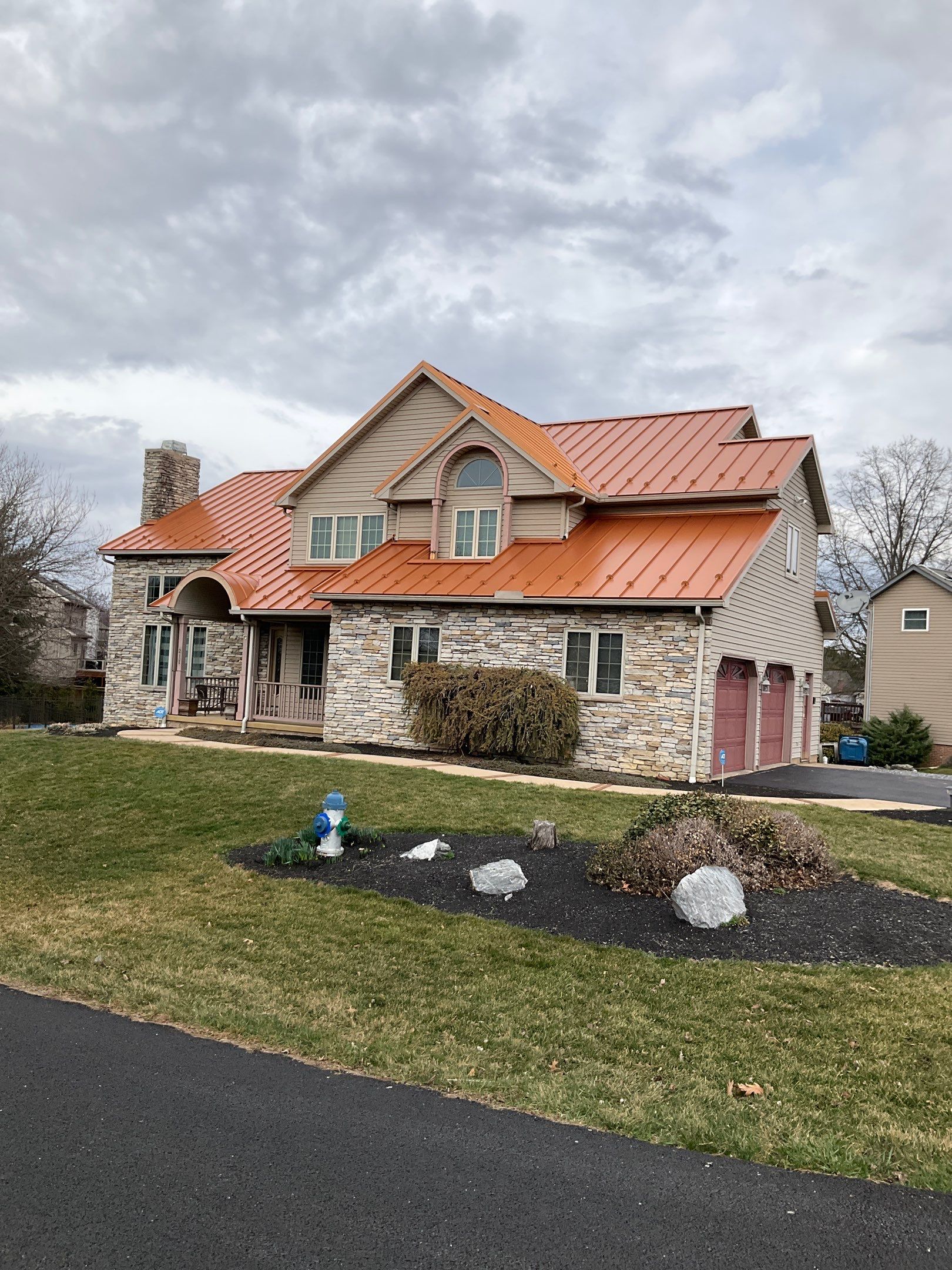 Standing Seam Roof – Copper Finish by Esh Builders