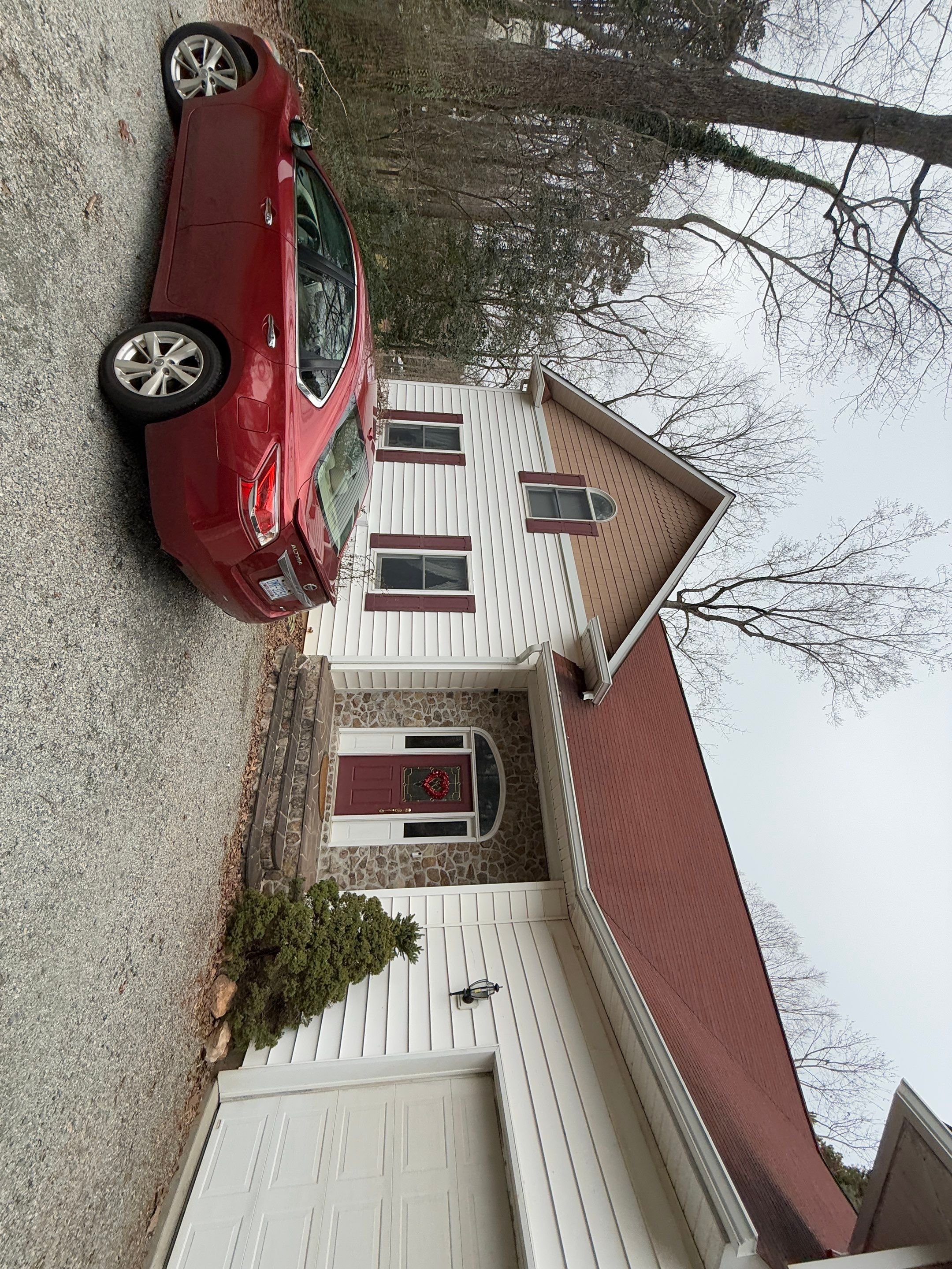 Residential Roofing Installation using  TAMKO Titan XT Rustic Redwood by RISE Roofing & Restoration, LLC
