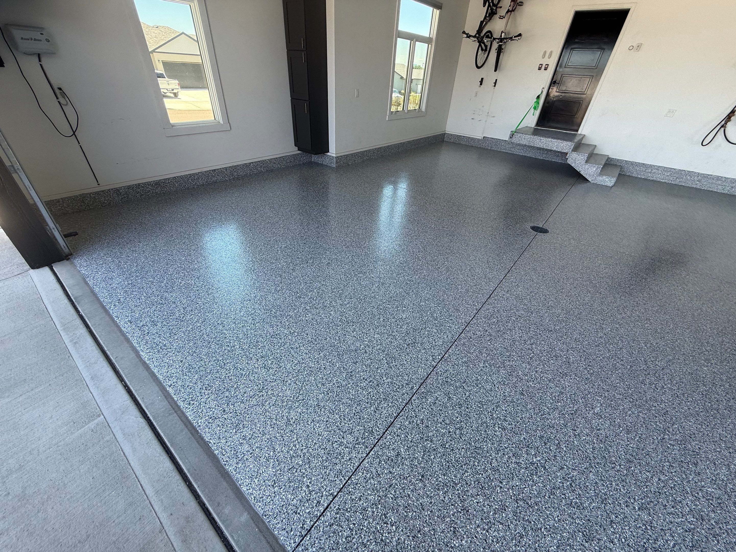 Gravel Flake Garage Floor Coating in Yankton by Select Painting, Coatings & Garage Cabinets