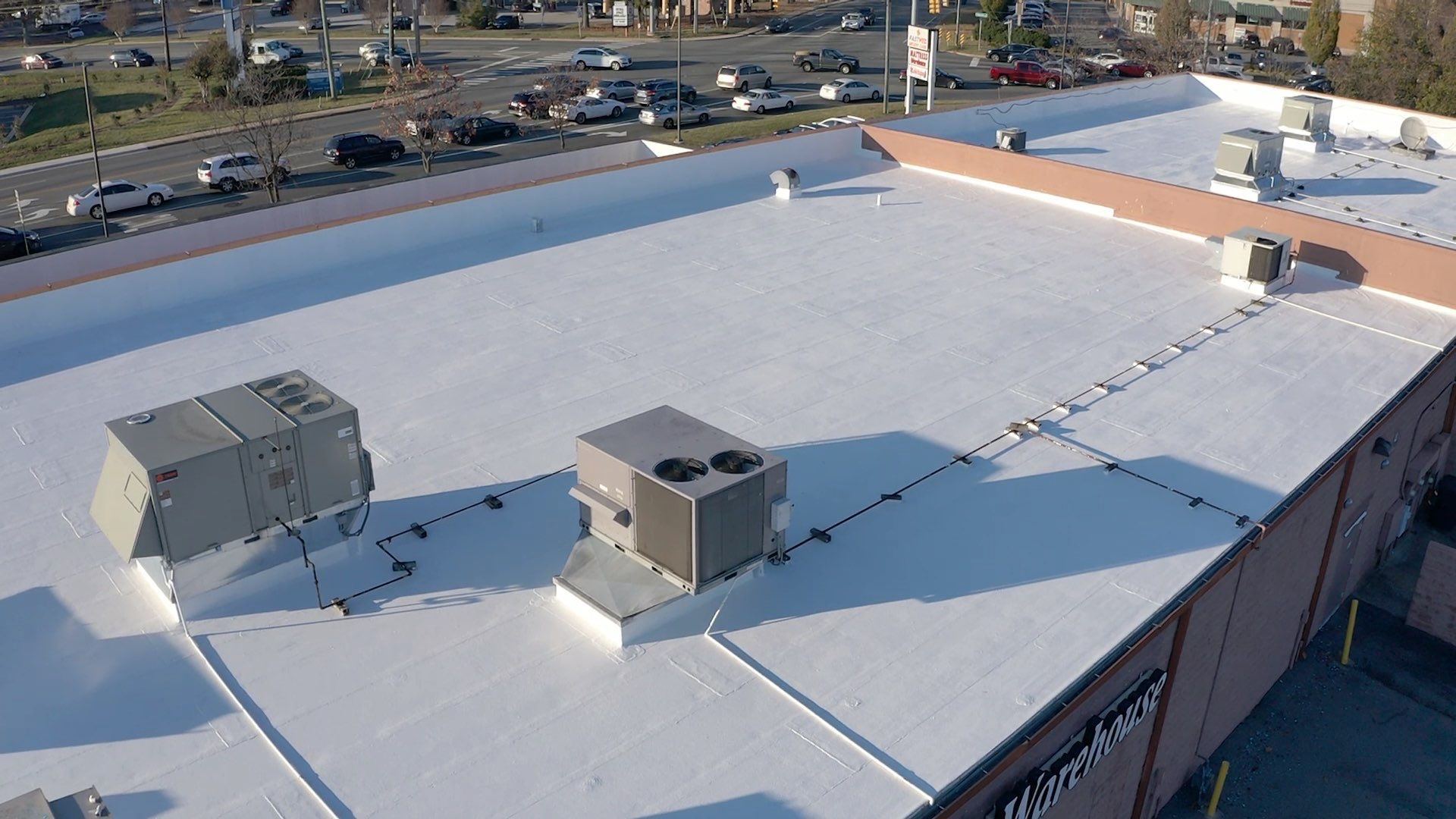 Commercial Coating using Poly Urerthane and Silicone Coating by Just In Time Roofing and Restoration