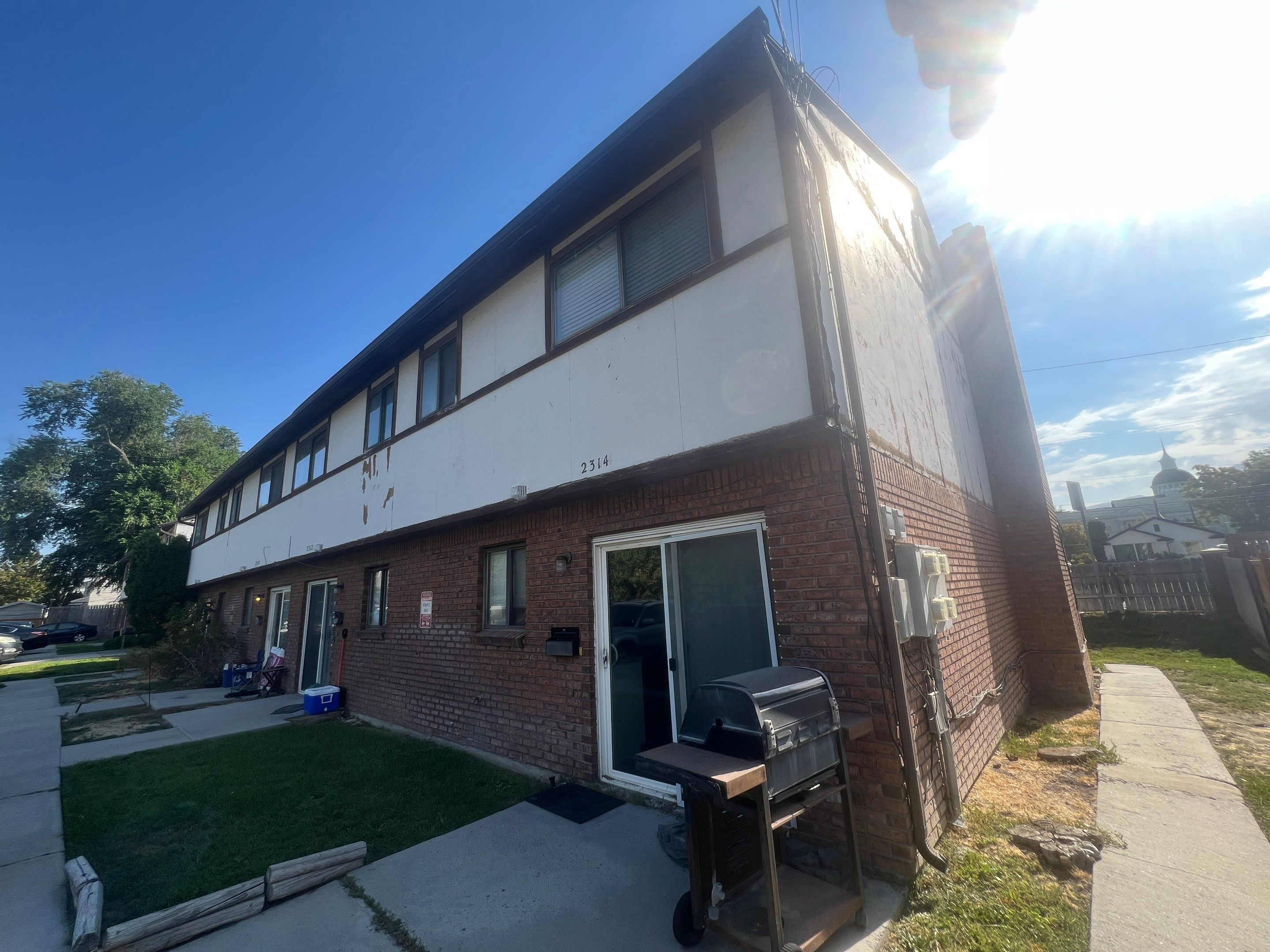 Salt Lake City | Wood Demo & Vinyl Upgrade | Nautica & White by Ideal Siding Utah
