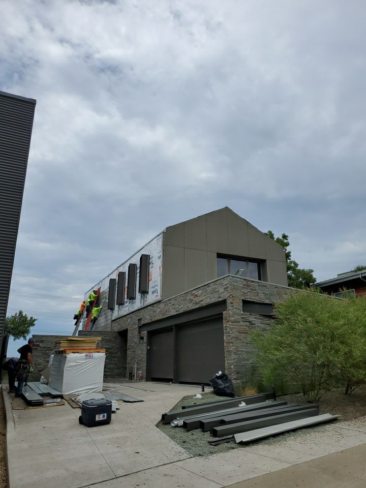 Metal Roofing project using MBCI Flexloc Panels - 22 gauge - silver metallic-in-color by Becker Roofing and Exteriors