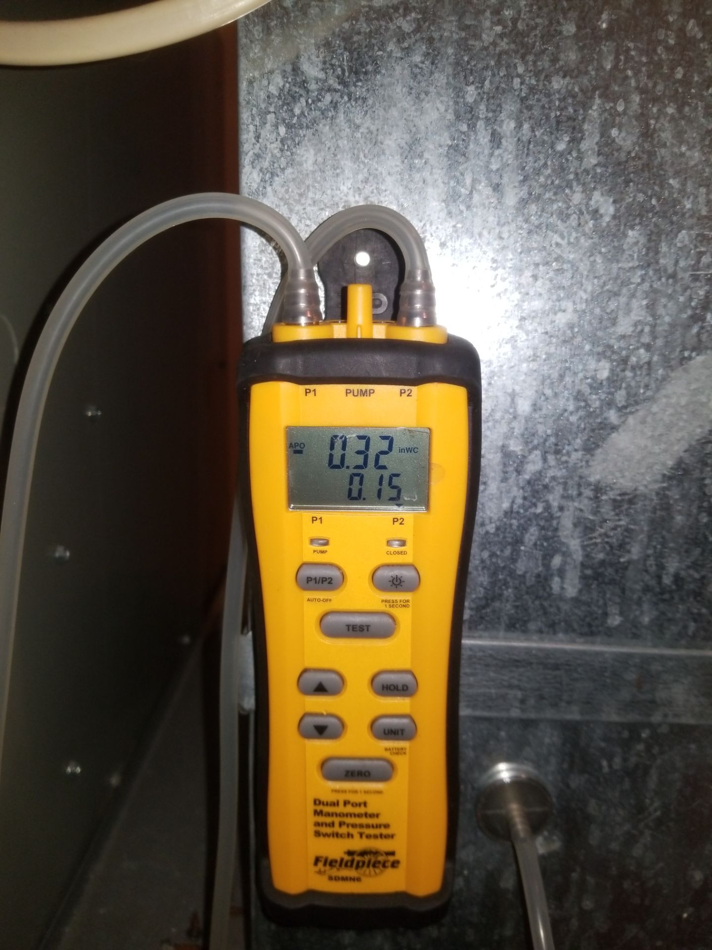 furnace inspection using UEI manometer by Sureway Comfort John Wilcox Plumbing Heating Cooling