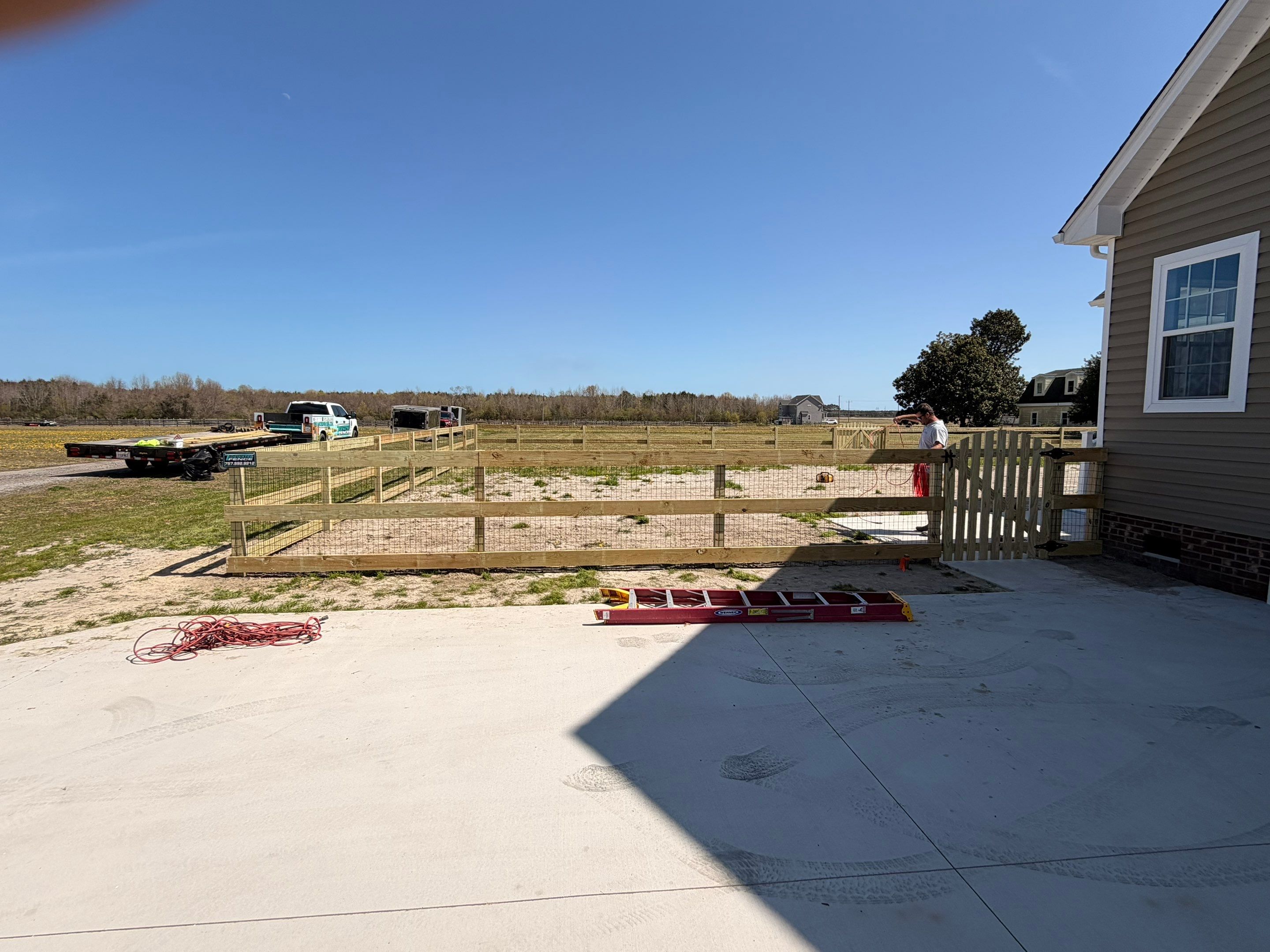 A Fence That Brings the Whole Yard Together by Tidewater Fence