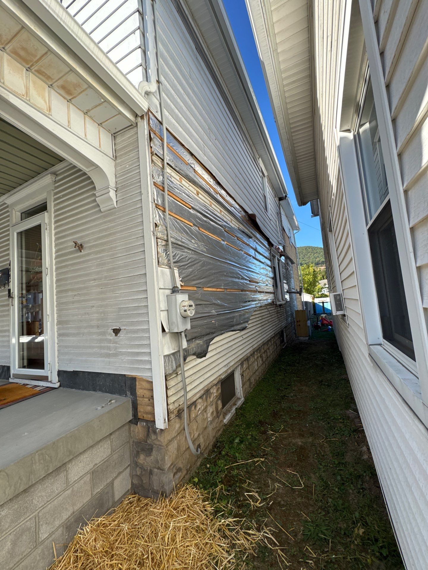 Charcoal Metal Roof & Blue Siding — A Refreshing New Look by Esh Builders