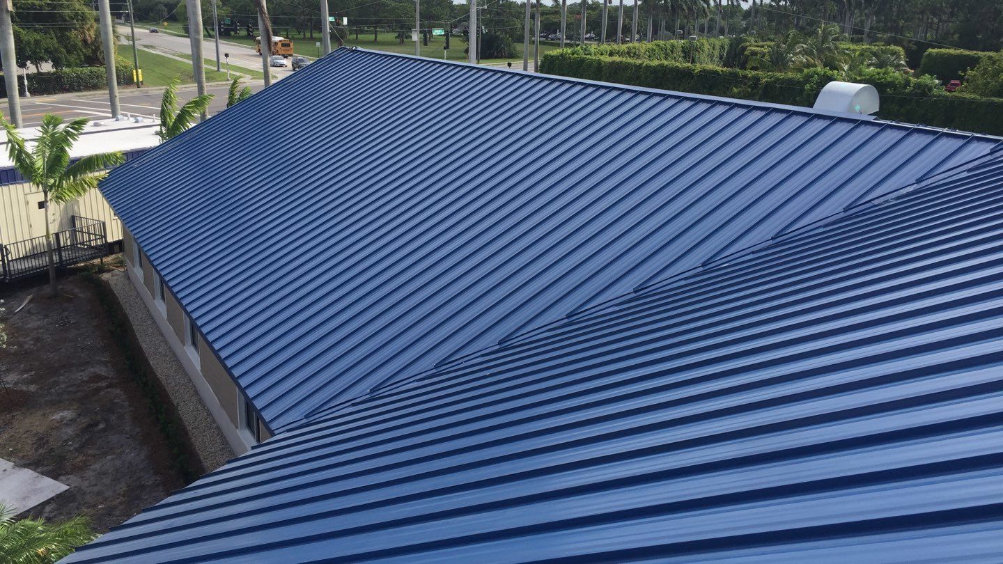 Residential Roofing Installation using 1.5'' Mechanical Seam by BLUES BROTHERS ROOFING