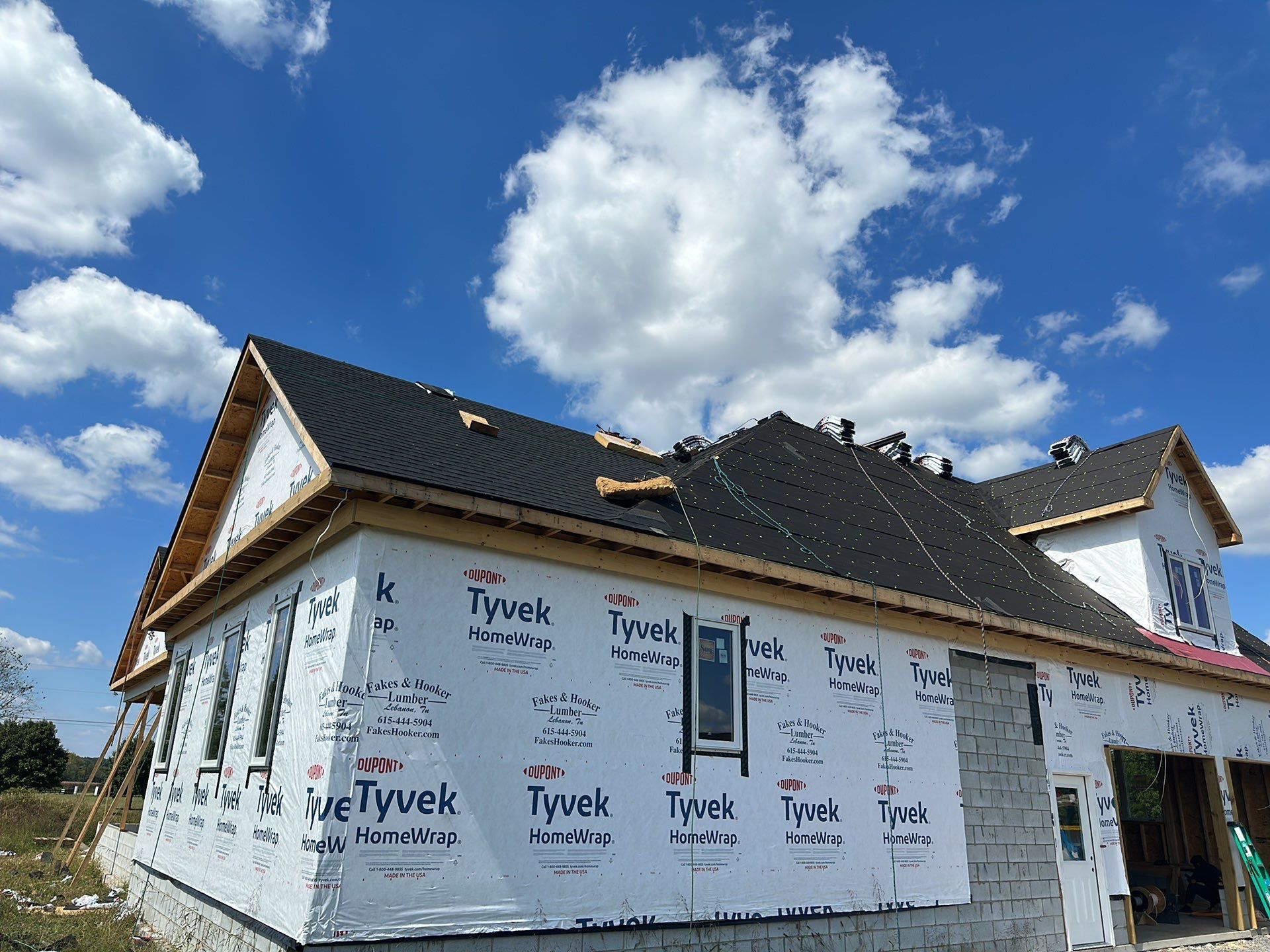 Residential Roofing Installation using Tamko Heritage AR with Standing Seam Metal Porch by Undersun Roofing 