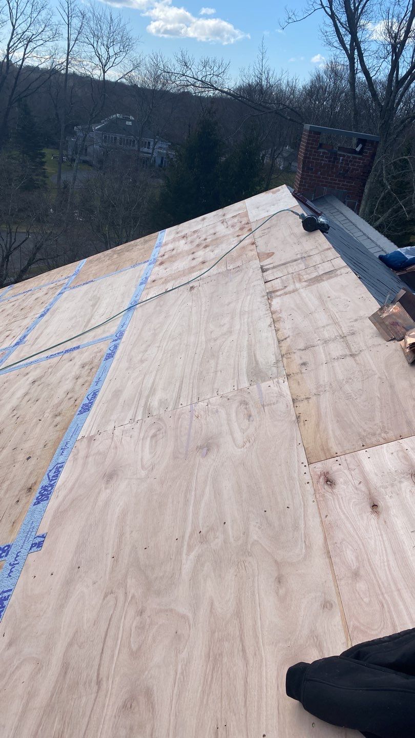Residential Roofing Installation using Vermont Slate by A Plus Exterior