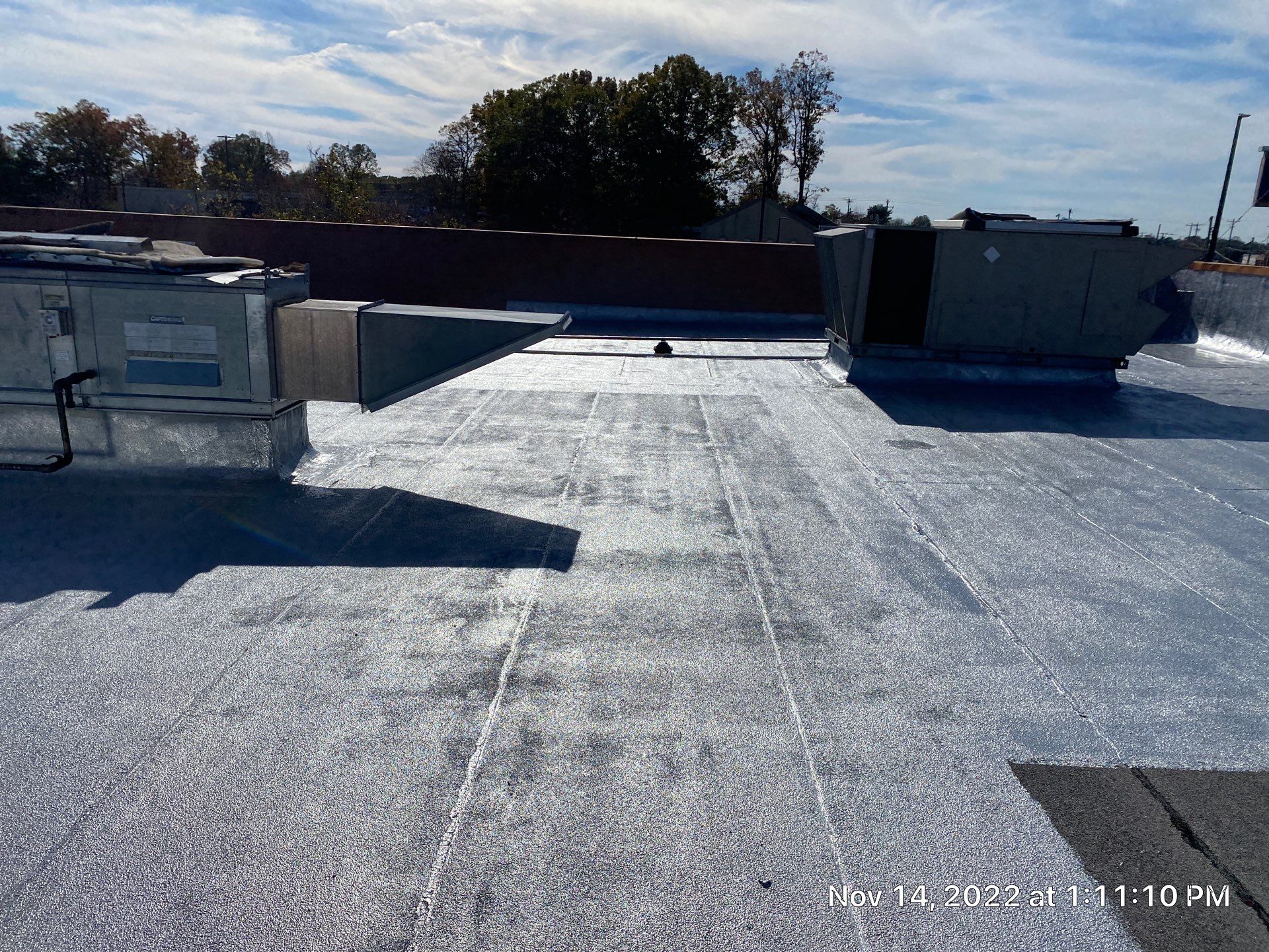 Commercial Coating using Poly Urerthane and Silicone Coating by Just In Time Roofing and Restoration