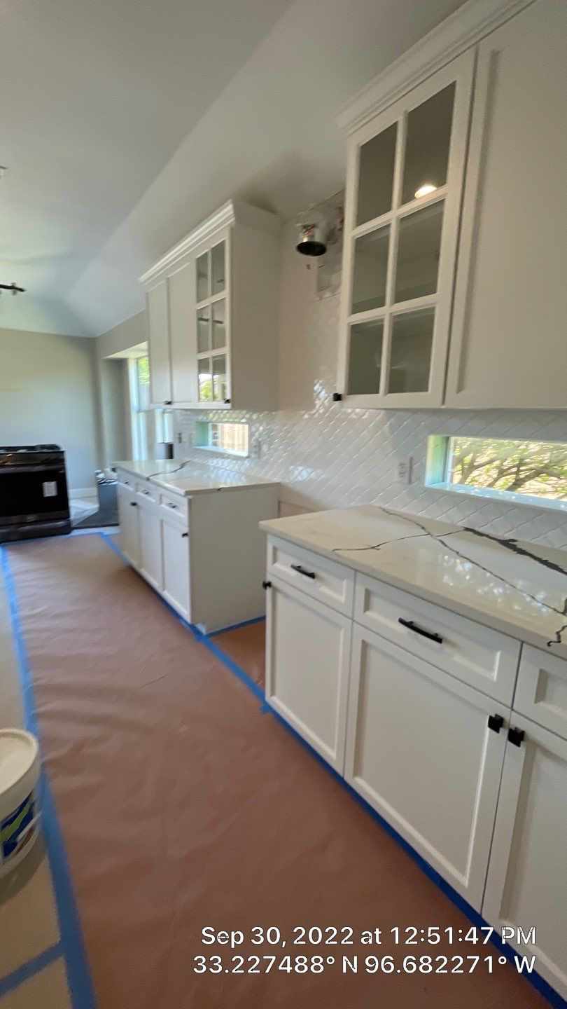 Custom cabinetry Kitchen Remodel by SLM General Contractors & Roofing