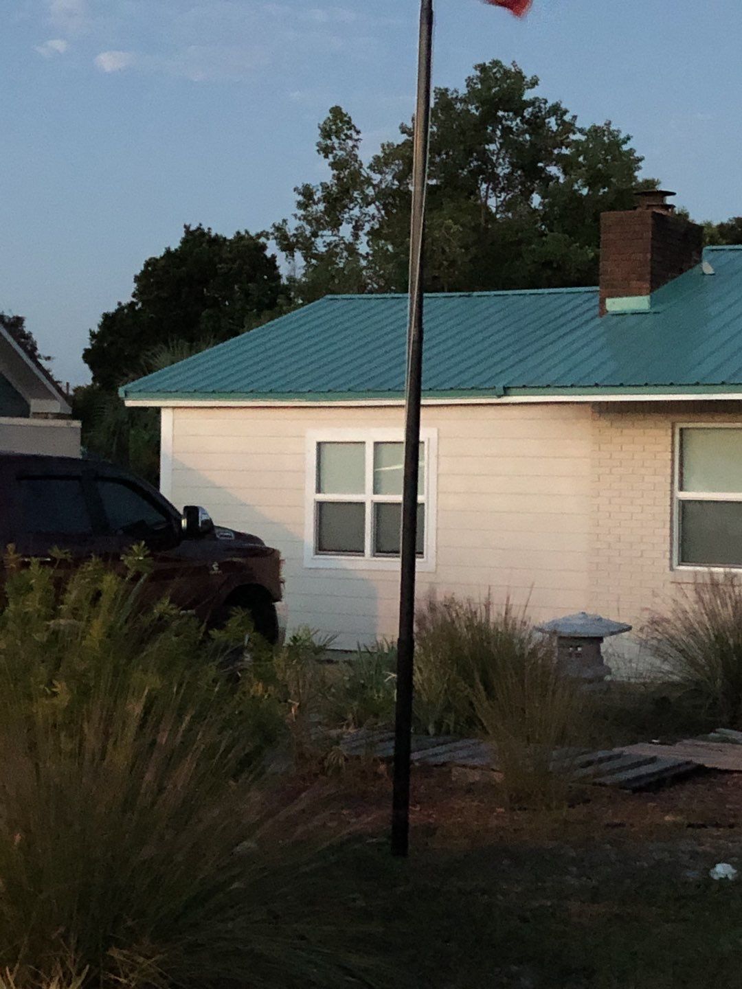 Gutter Installation using K-Style White Seamless Gutters by Gutter Professors