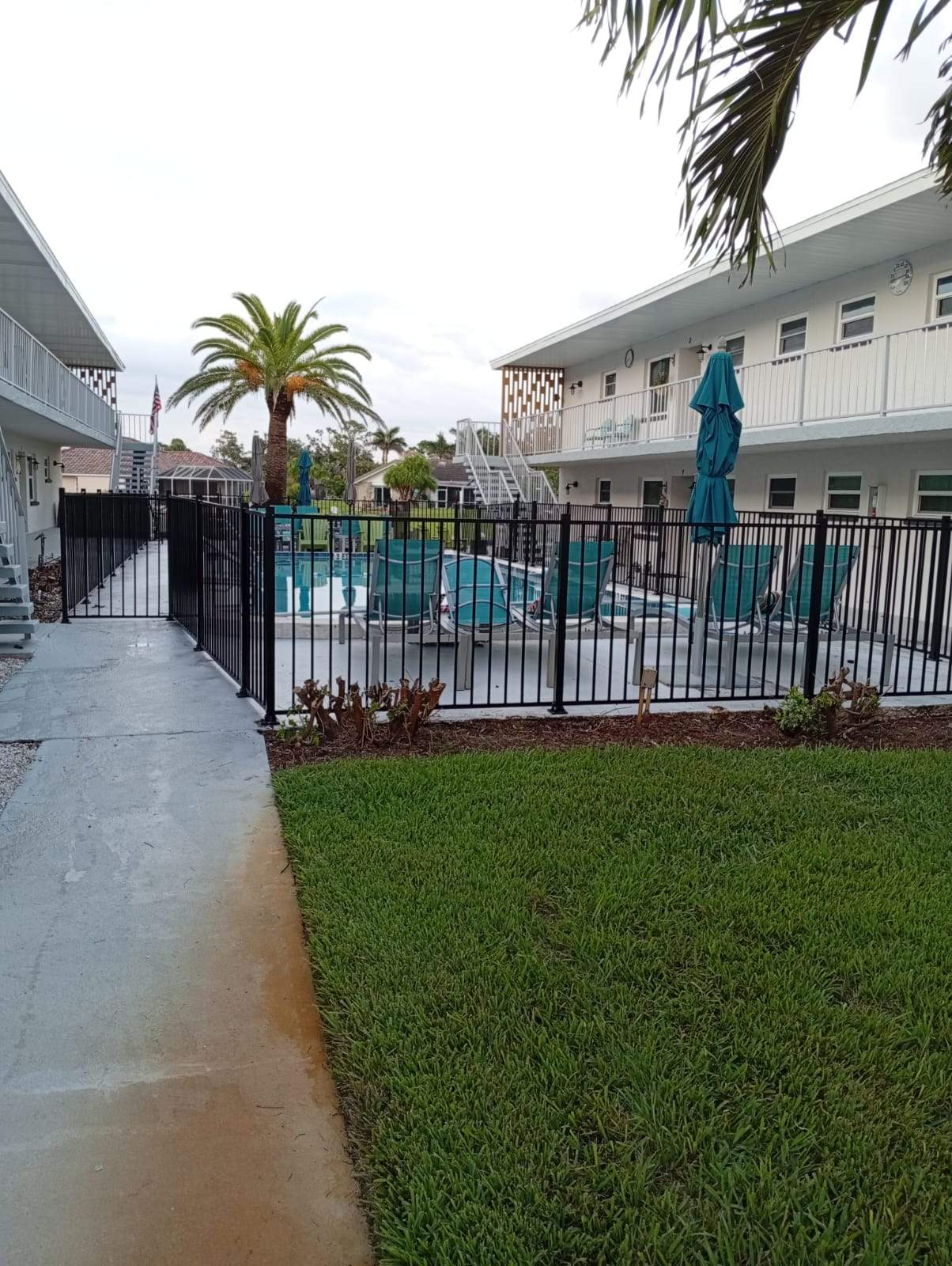 Black Aluminum Pool Fence Replacement in Englewood by True Fence LLC