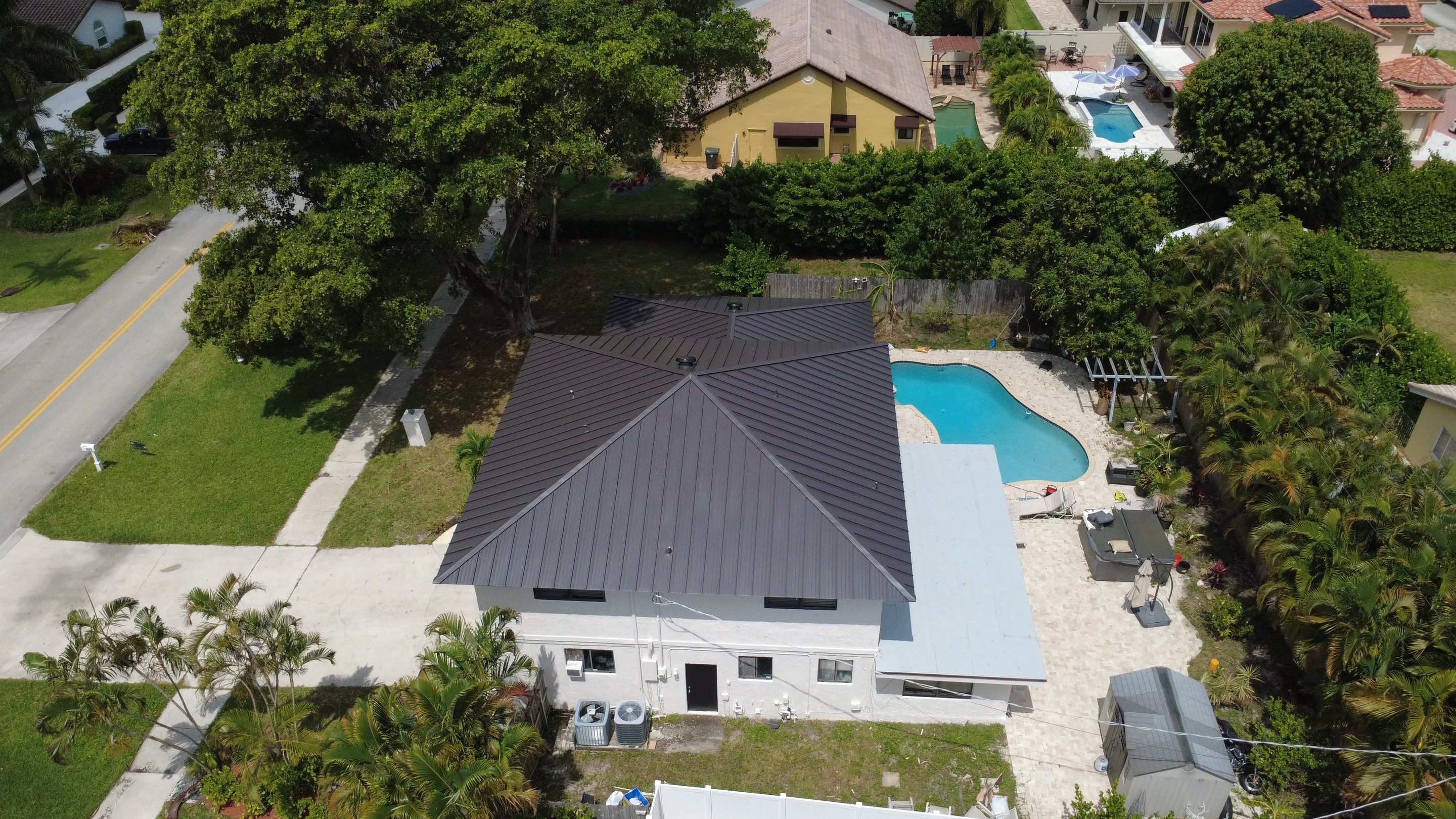 Residential Roofing Installation using 1.5'' Mechanical Seam by BLUES BROTHERS ROOFING