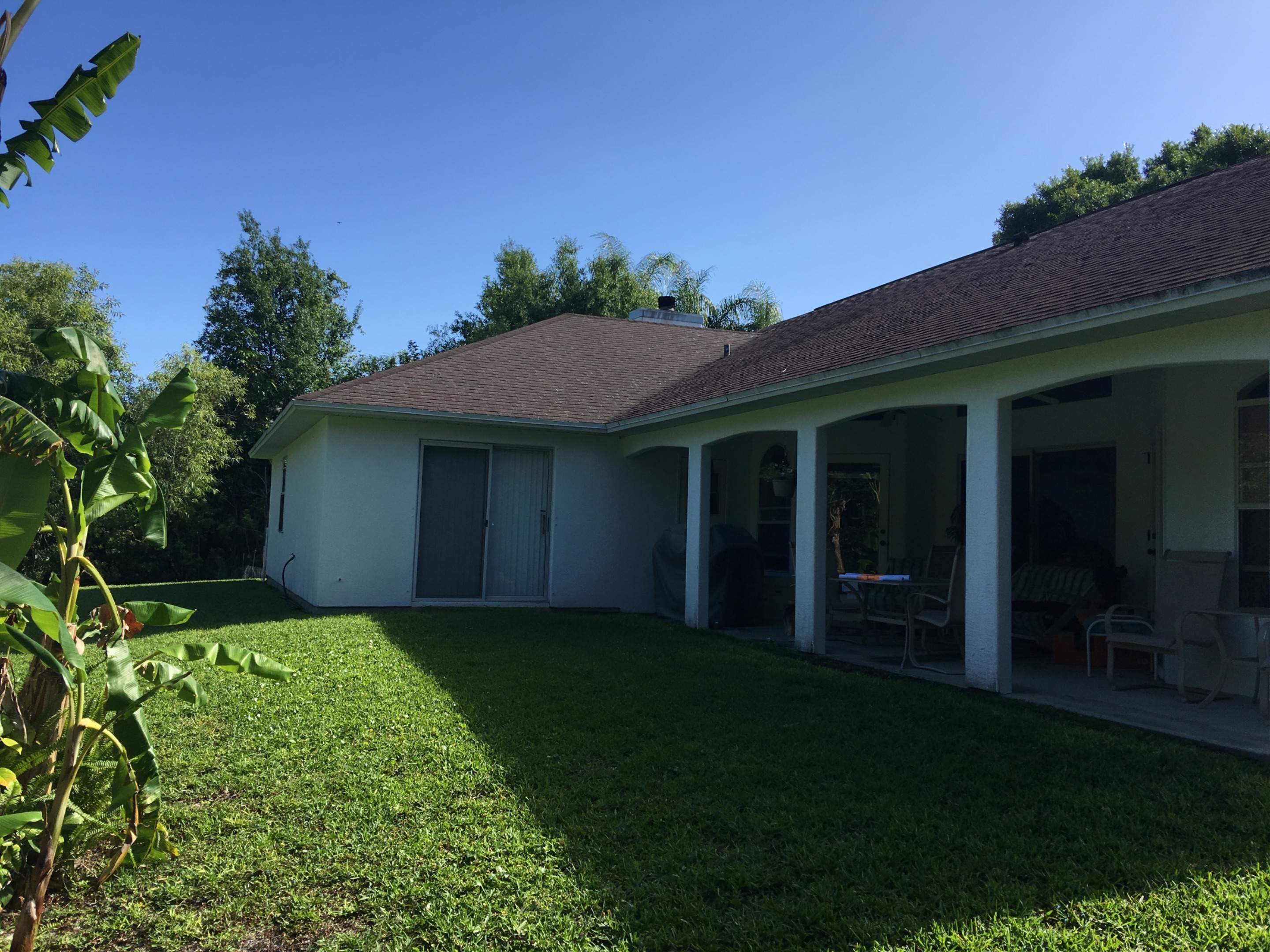 Covered Porch Extension and Structural Patio Addition in Melbourne by Florida Roofing and Renovations Inc.