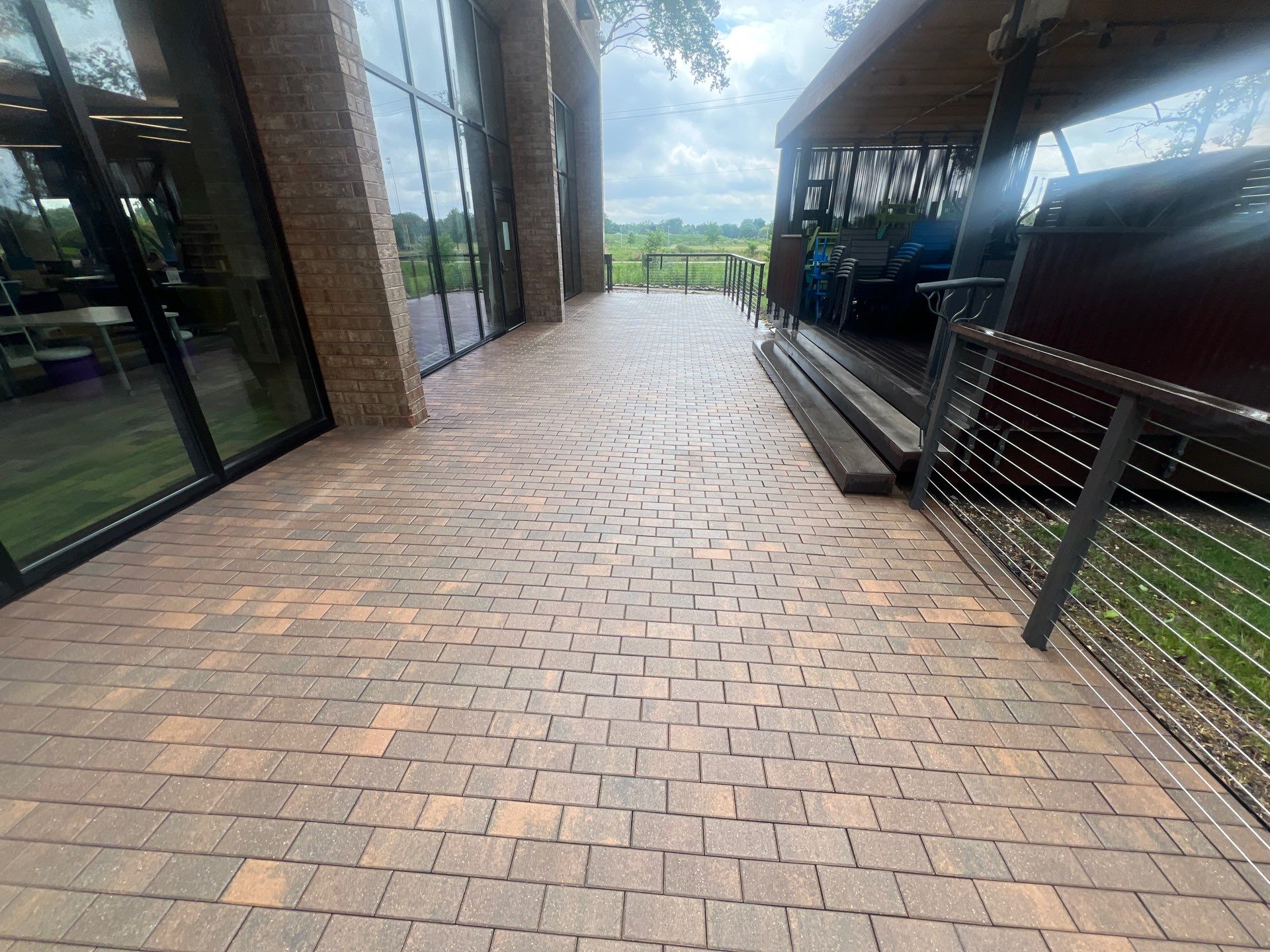 Brick paver repair, cleaning, sealing and poly sanding by Northern Power Washing LLC.