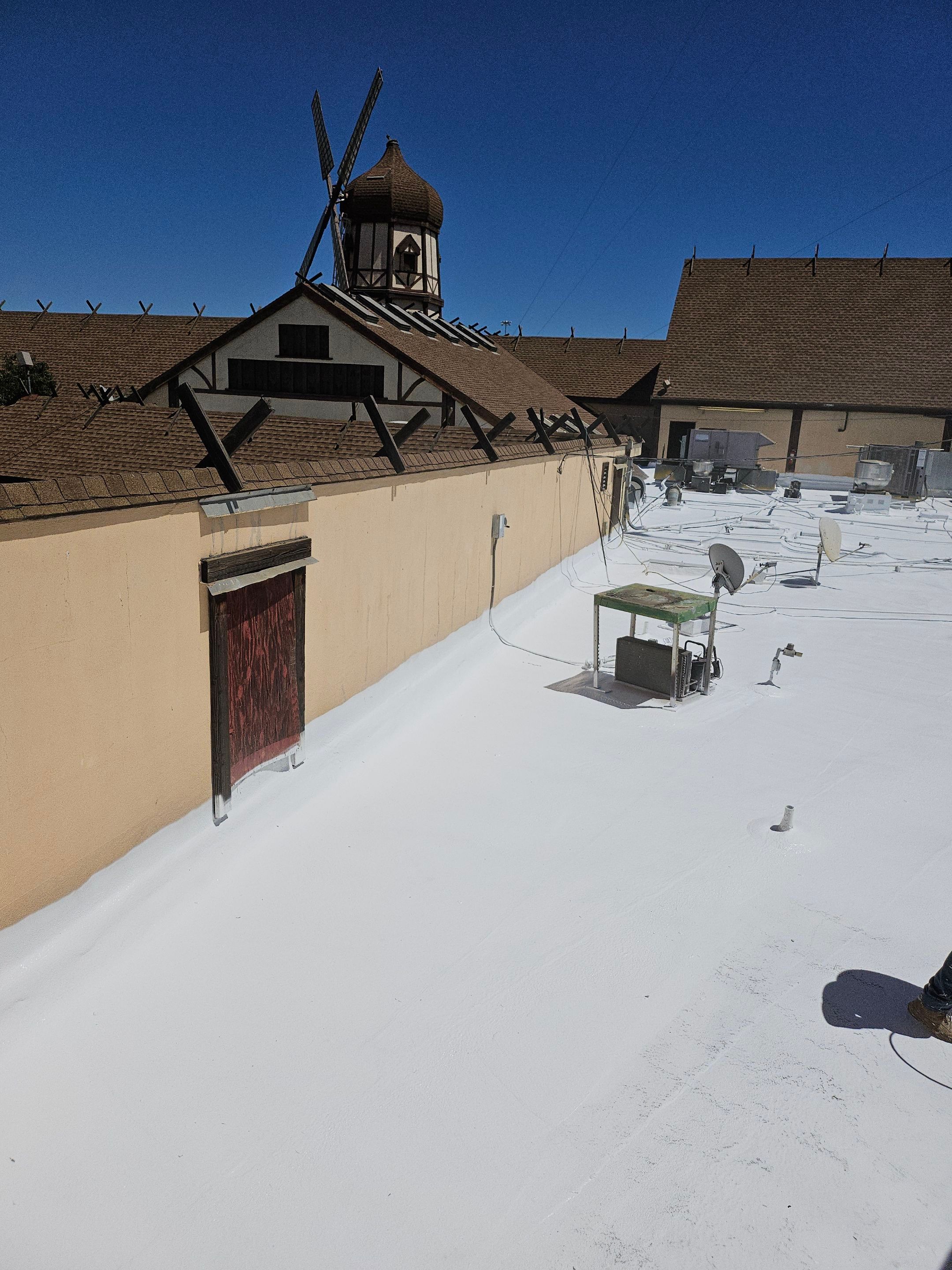 Spray foam and coatings using General Coatings acrylic coatings and spray foam by Straight Edge Roofing Inc