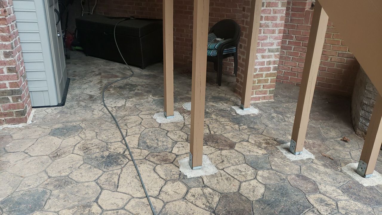 patio cleaning using cleaner by Power Wash Masters LLC