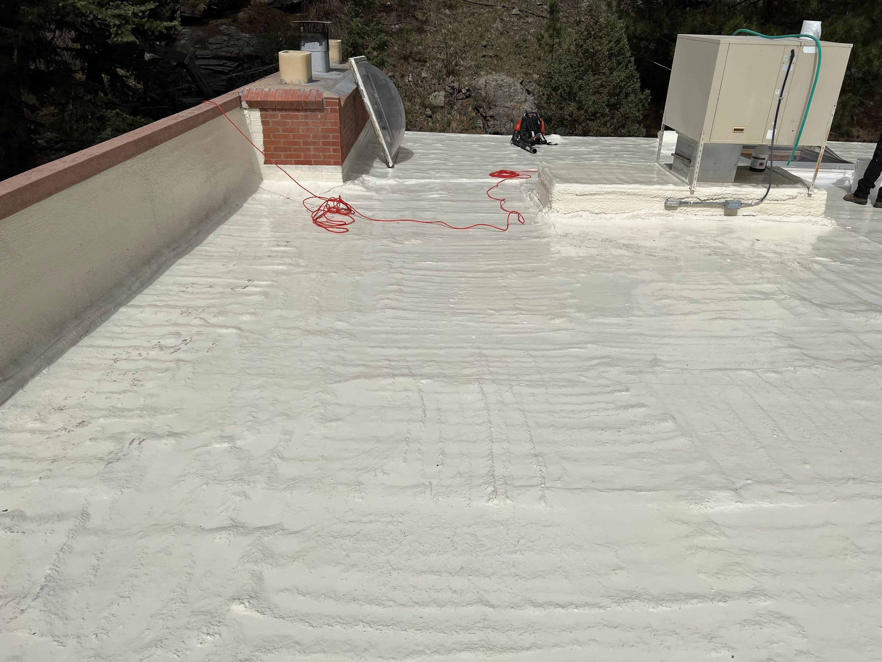 Commercial Roofing Installation using CASTAGRA ECODUR COATING by A to Z Roofing