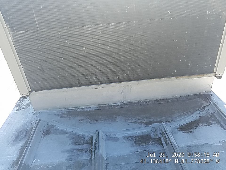 Commercial Metal Roof Coating by Gold Star Roofing LLC