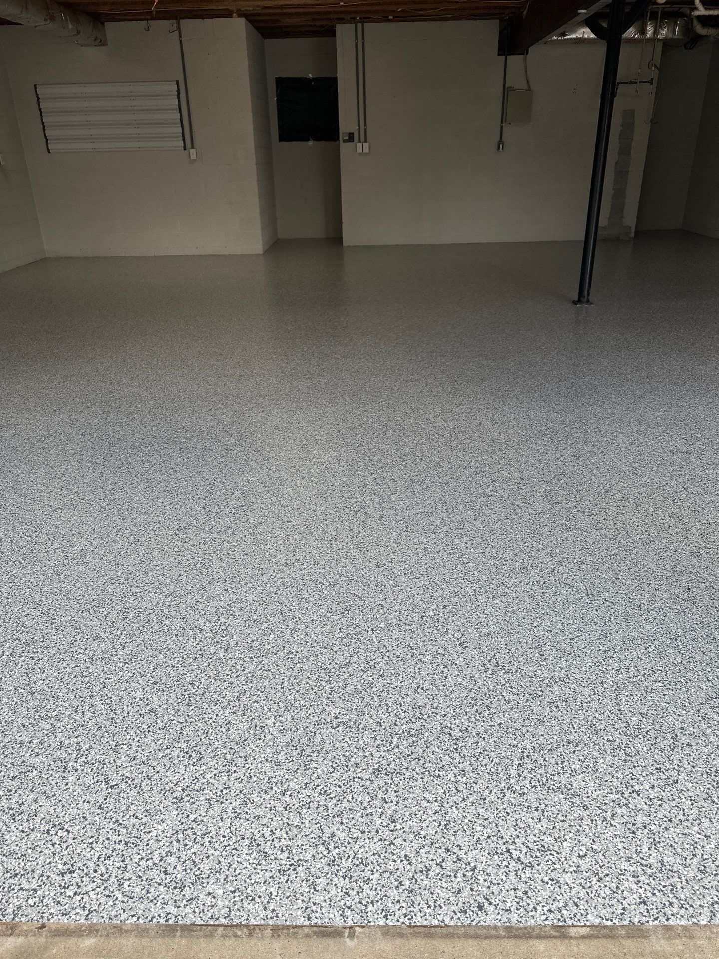 Garage Floor Coating using Gravel by My Garage Floor Guys