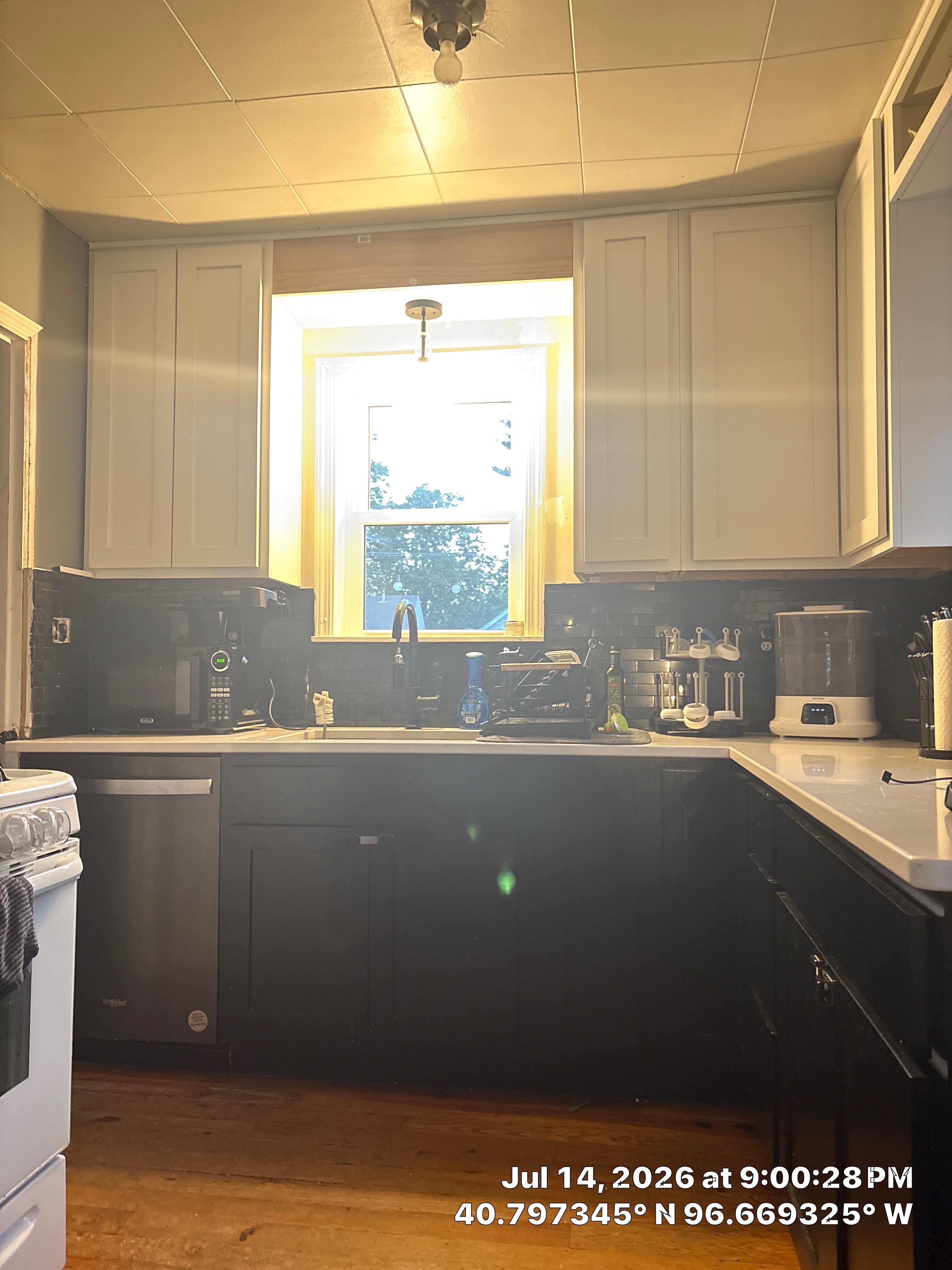 Two-Tone Kitchen Remodel with Quartz Countertops in Lincoln by CompanyCam Sales Demo