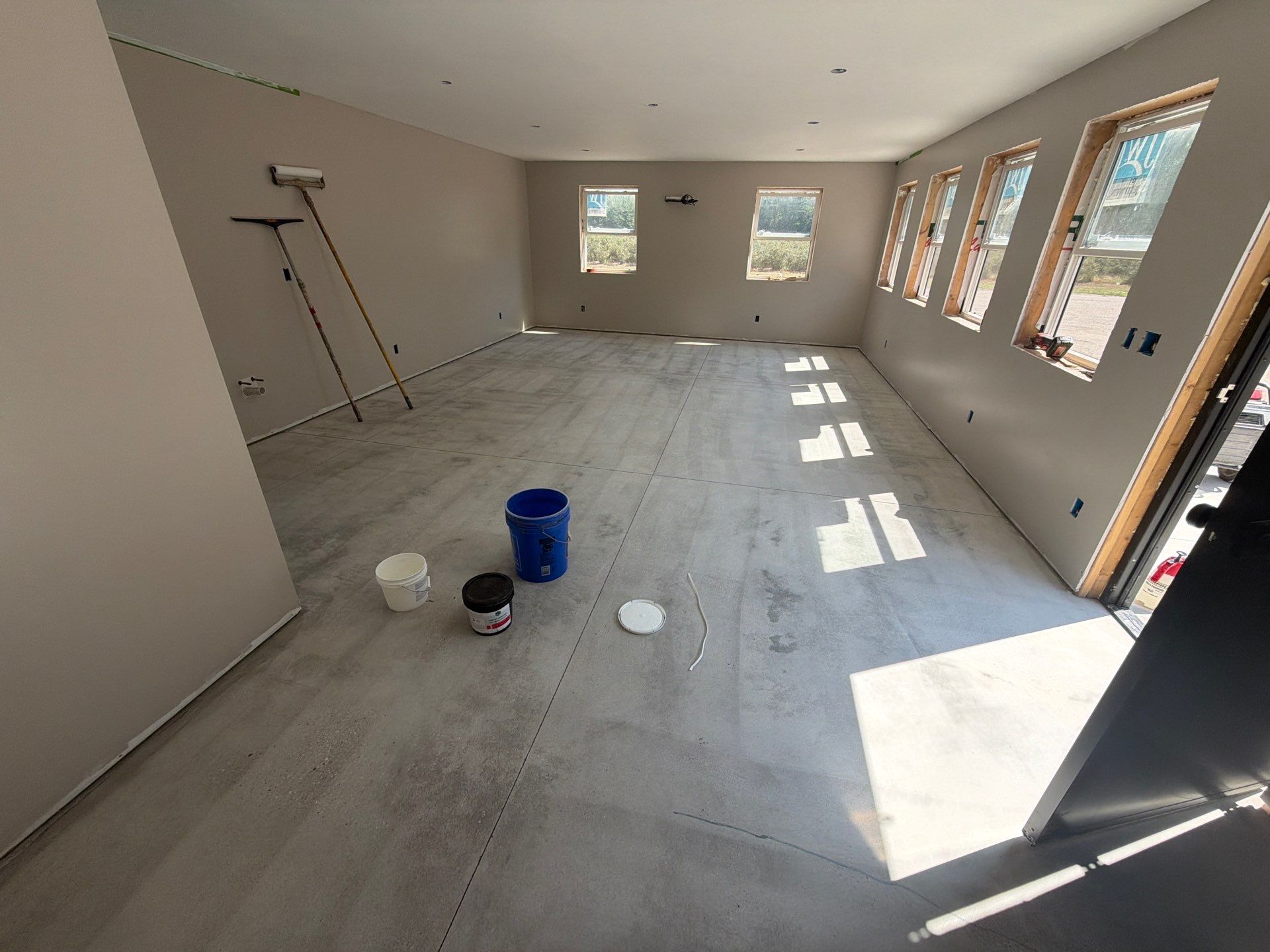 ShoreLine Epoxy Flake Floor Installation for Grand Haven Workshop by Gordon Painting
