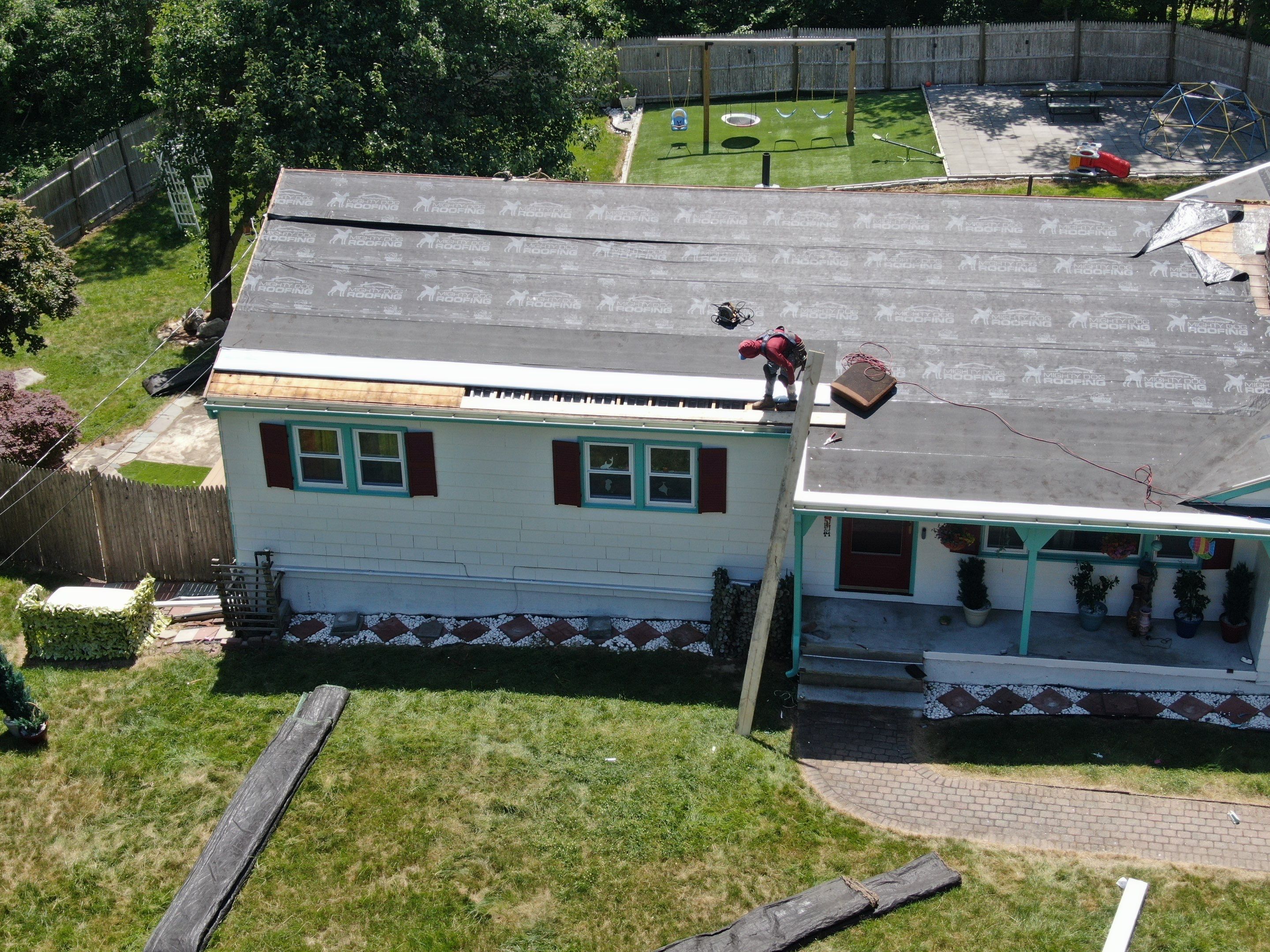 Roof Replacement with Gutter Guards – Westford, MA by Mighty Dog Roofing of Greater Middlesex County