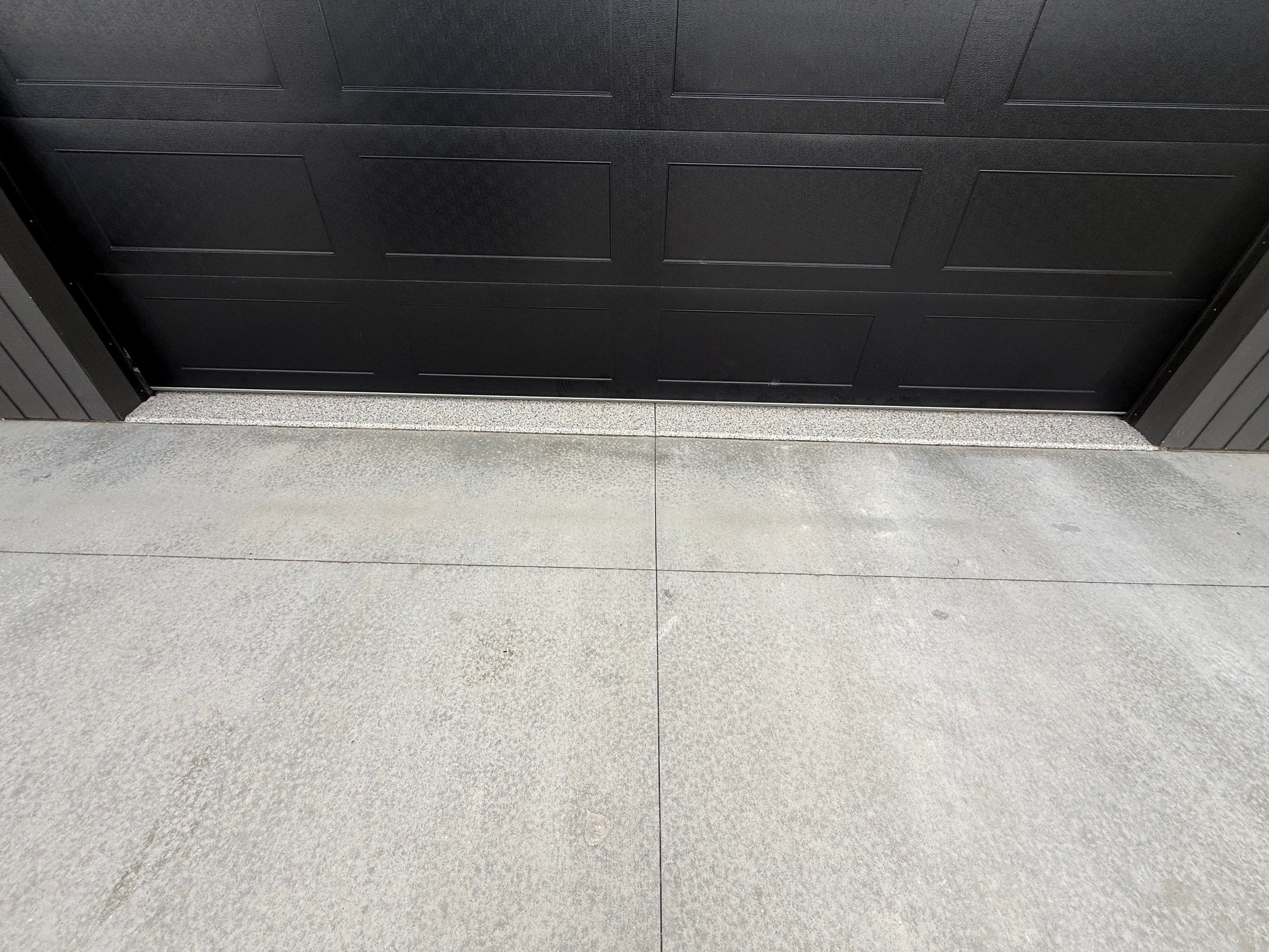 Custom Speckled Concrete Coating for Dell Rapids Garage by Select Painting, Coatings & Garage Cabinets
